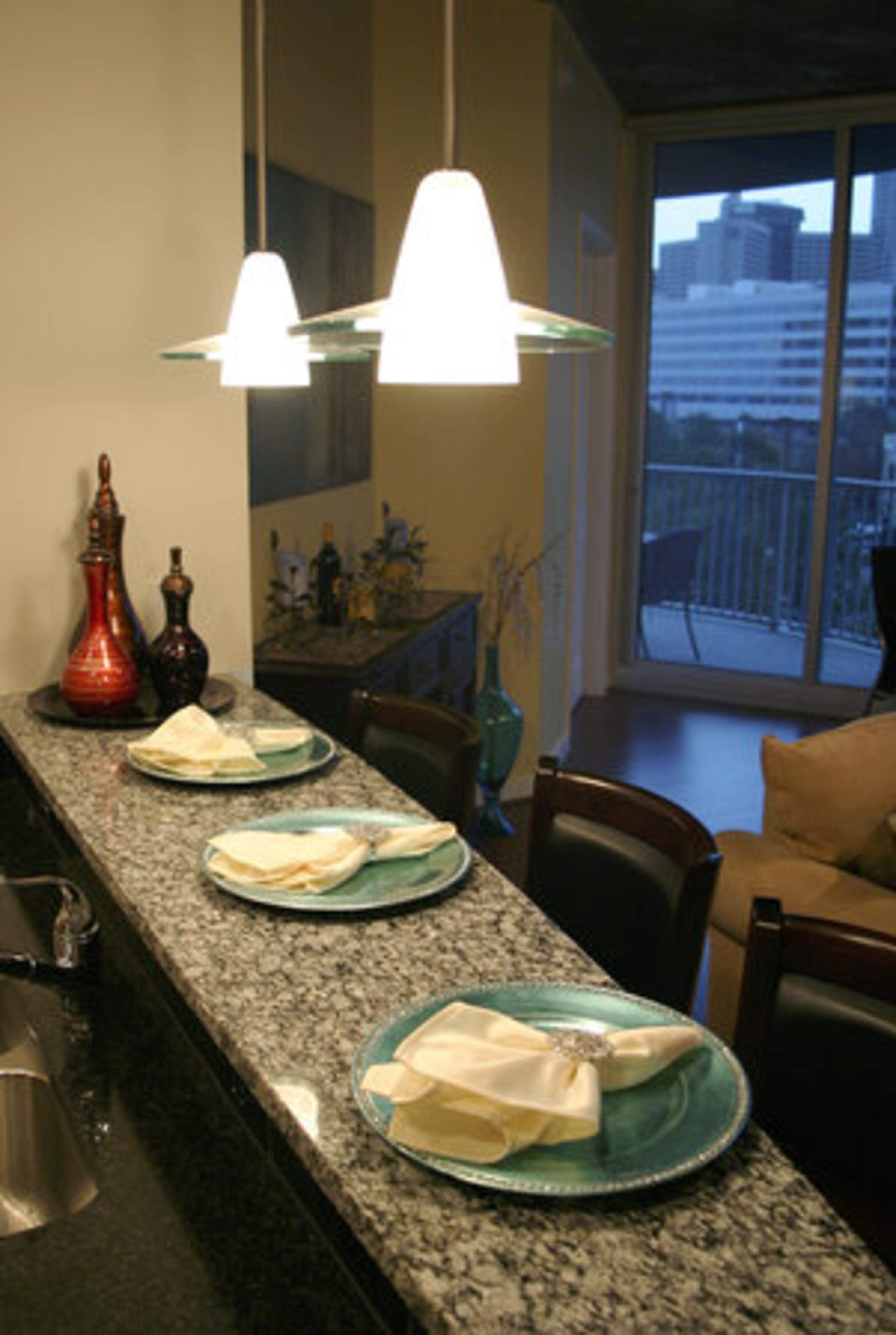 The kitchen is the fave spot. "Especially when my family comes," says Saif, "the kitchen is where everybody is at, simply because my mom is a caterer, when she comes she's usually cooking up a storm and we're right behind her eating."