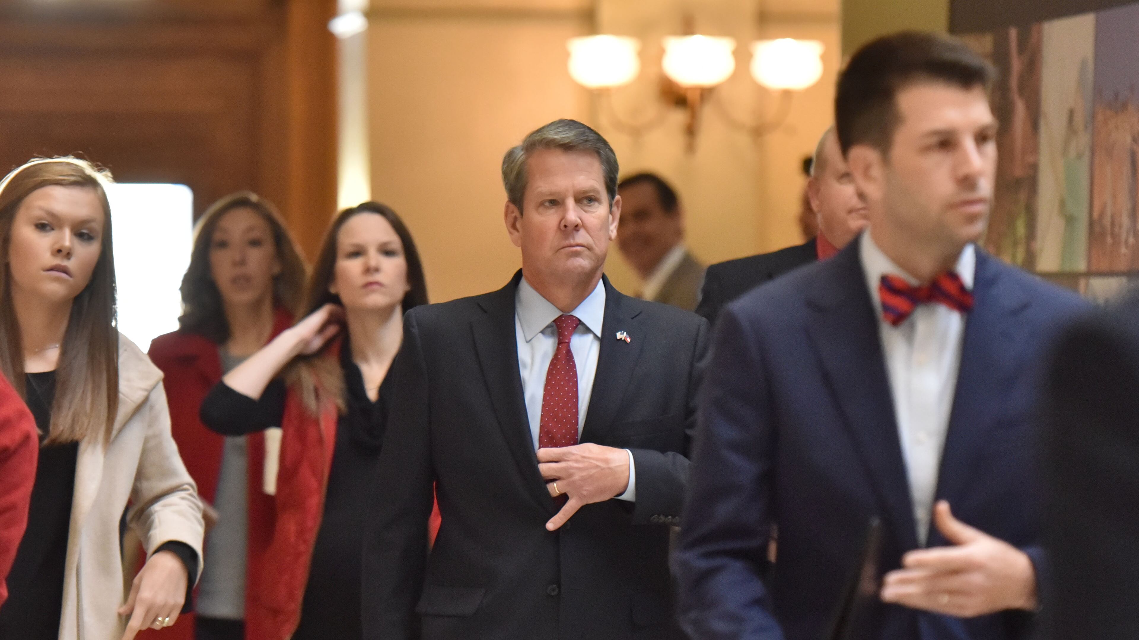 Gov.-elect Brian Kemp arrives at a press conference. HYOSUB SHIN / HSHIN@AJC.COM