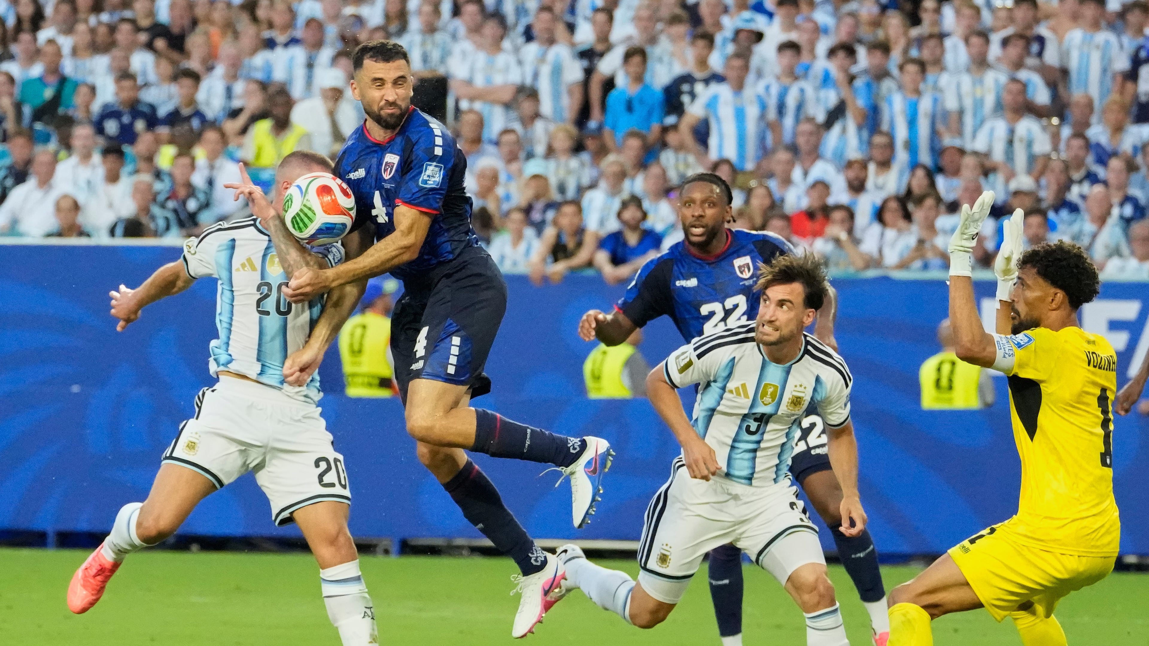 Argentina's Alexis Mac Allister (20) and Cape Verde's Pico Lopes (4) compete for the ball during the World Cup round of 32 soccer match between Argentina and Cape Verde in Miami Gardens, Fla., Friday, July 3, 2026. (AP Photo/Chris Carlson)