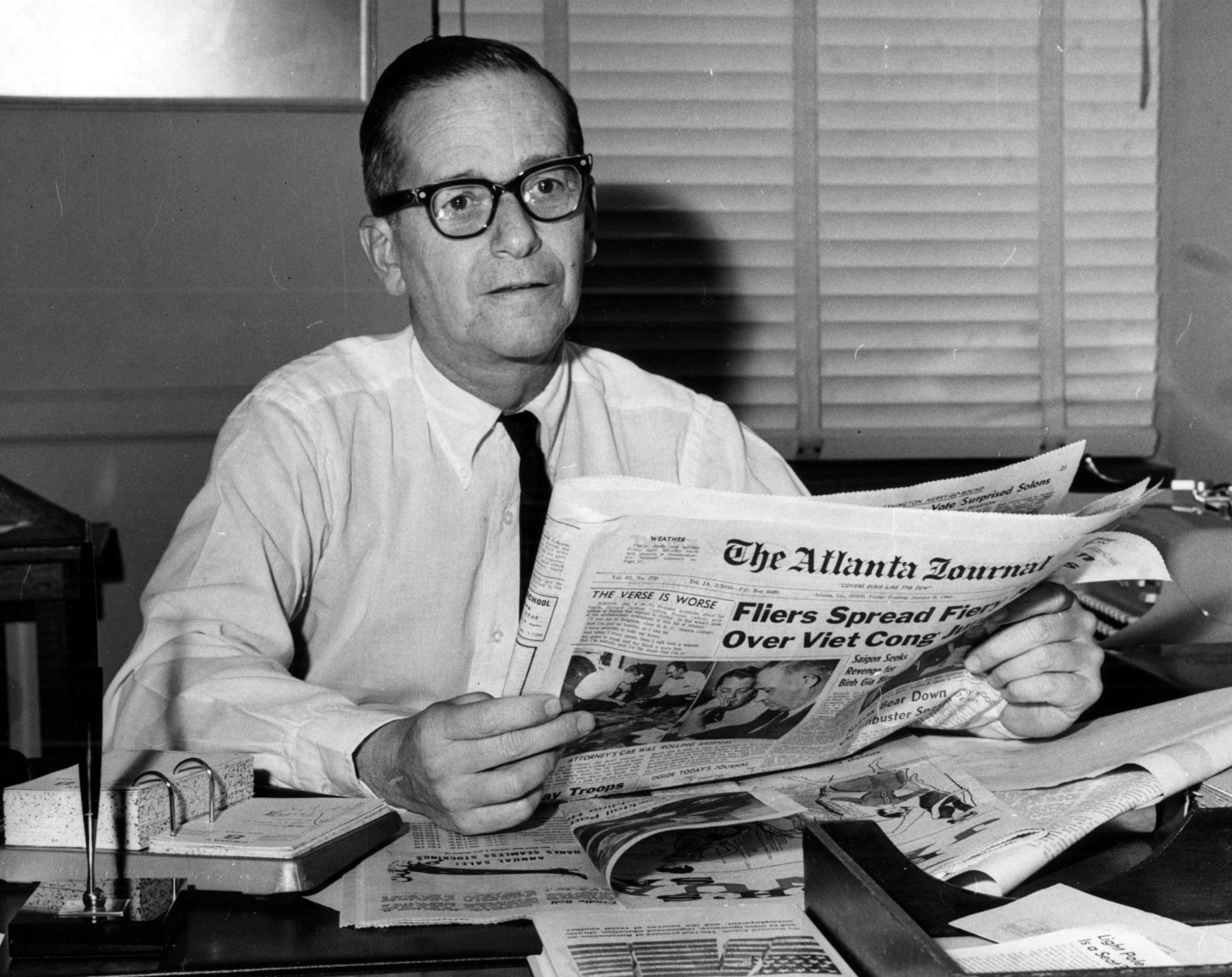 Join us now for this trip into the AJC photo archives as we reminisce about the events, large and small, that marked the year 1964. We start in January -- Atlanta Journal editor Jack Spalding looks over the day's news.