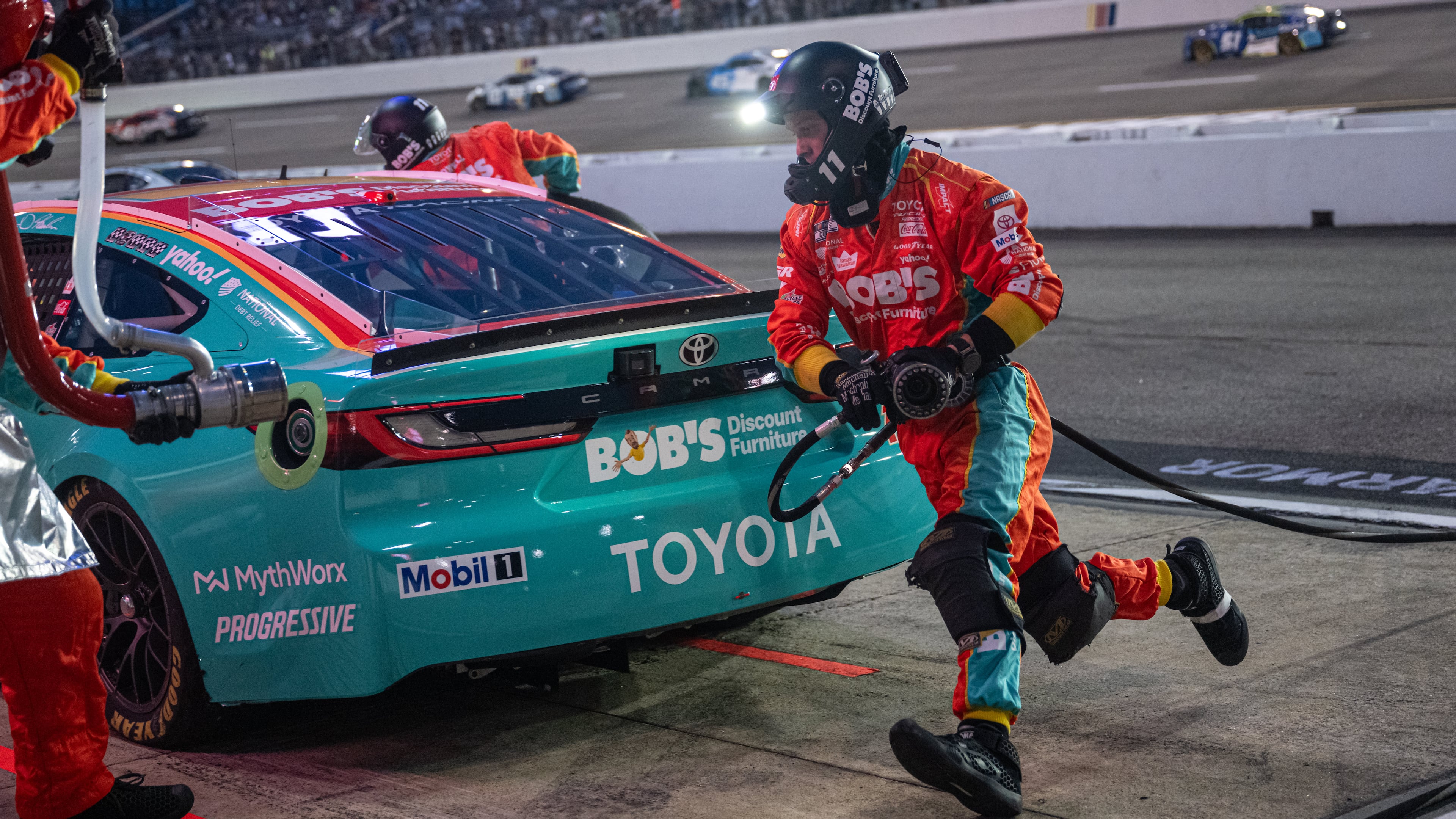 Joe Gibbs Racing driver Denny Hamlin (11) pit crew goes over the wall during Cook Out 400 at Richmond Raceway, Saturday, Aug. 15, 2026, in Richmond Va. (AP Photo/Robert Simmons)