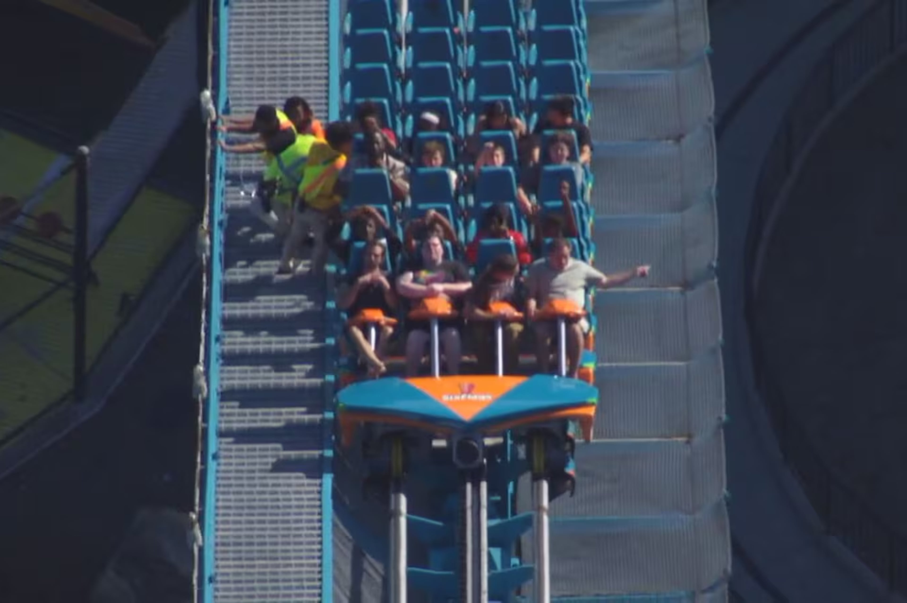 The Goliath roller coaster at Six Flags over Georgia in Austell is evacuated by park personnel on Monday, Oct. 12, 2026. One person died and several others were injured in “an incident involving a roller coaster” at the park, Cobb County Police said Monday evening. (Courtesy WSB-TV)