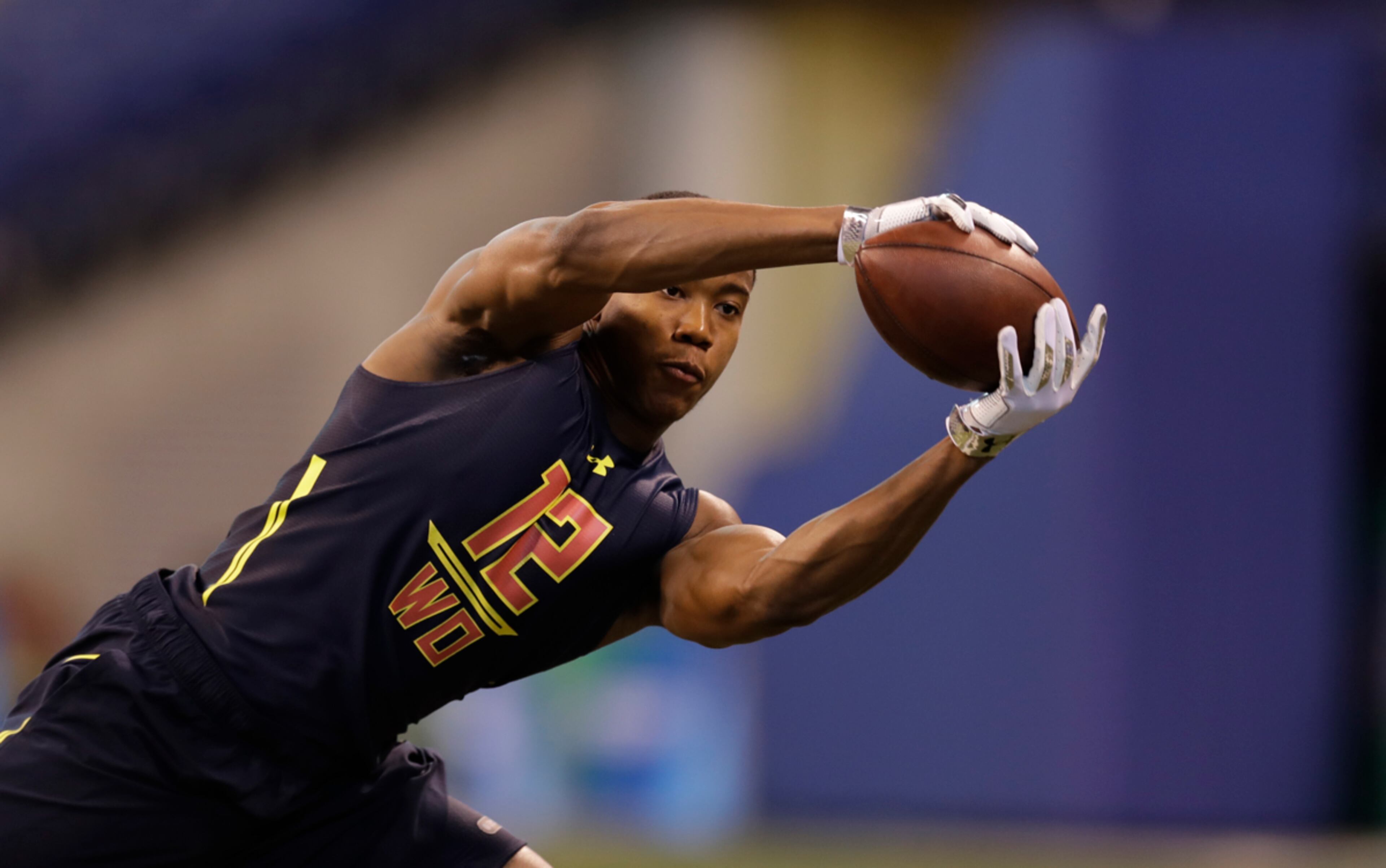 Georgia State wide receiver Robert Davis runs a drill at the NFL football scouting combine Saturday, March 4, 2017, in Indianapolis. (AP Photo/David J. Phillip)