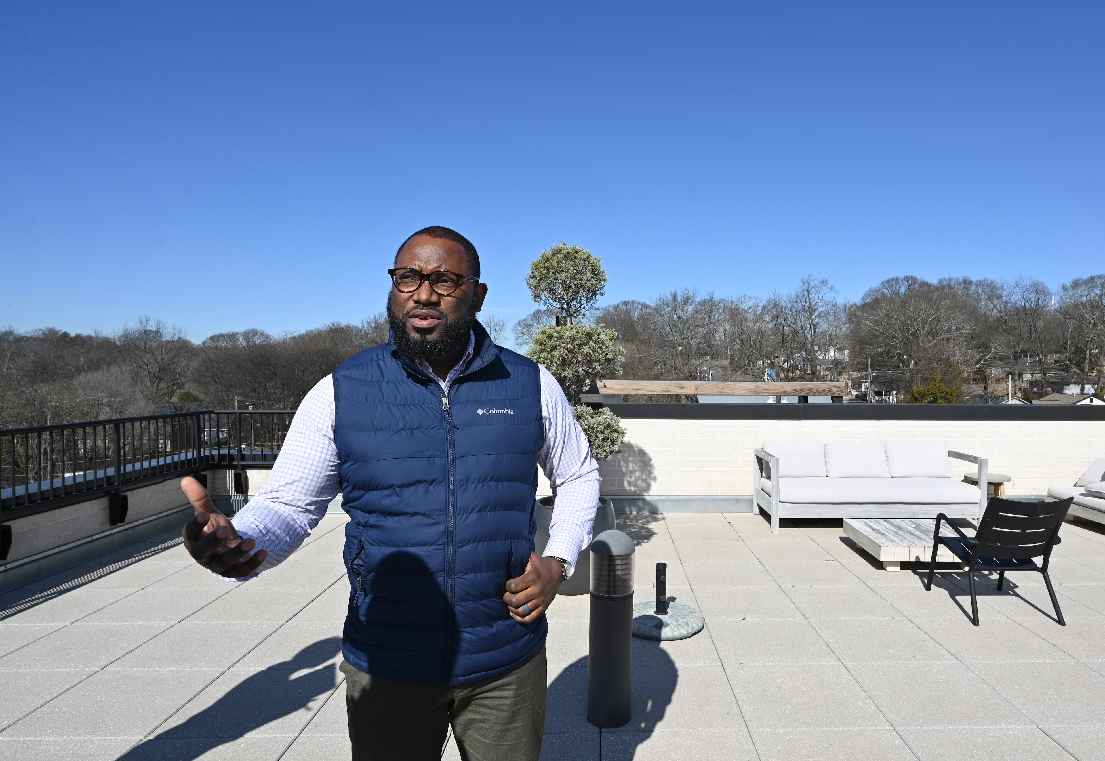 Walter Slaton, property manager, speaks at the rooftop of Pittsburgh Yards, a mixed-use development that spans 31 acres off University Avenue along the Beltline in southwest Atlanta, Tuesday, Jan. 24, 2023. (Hyosub Shin / Hyosub.Shin@ajc.com)