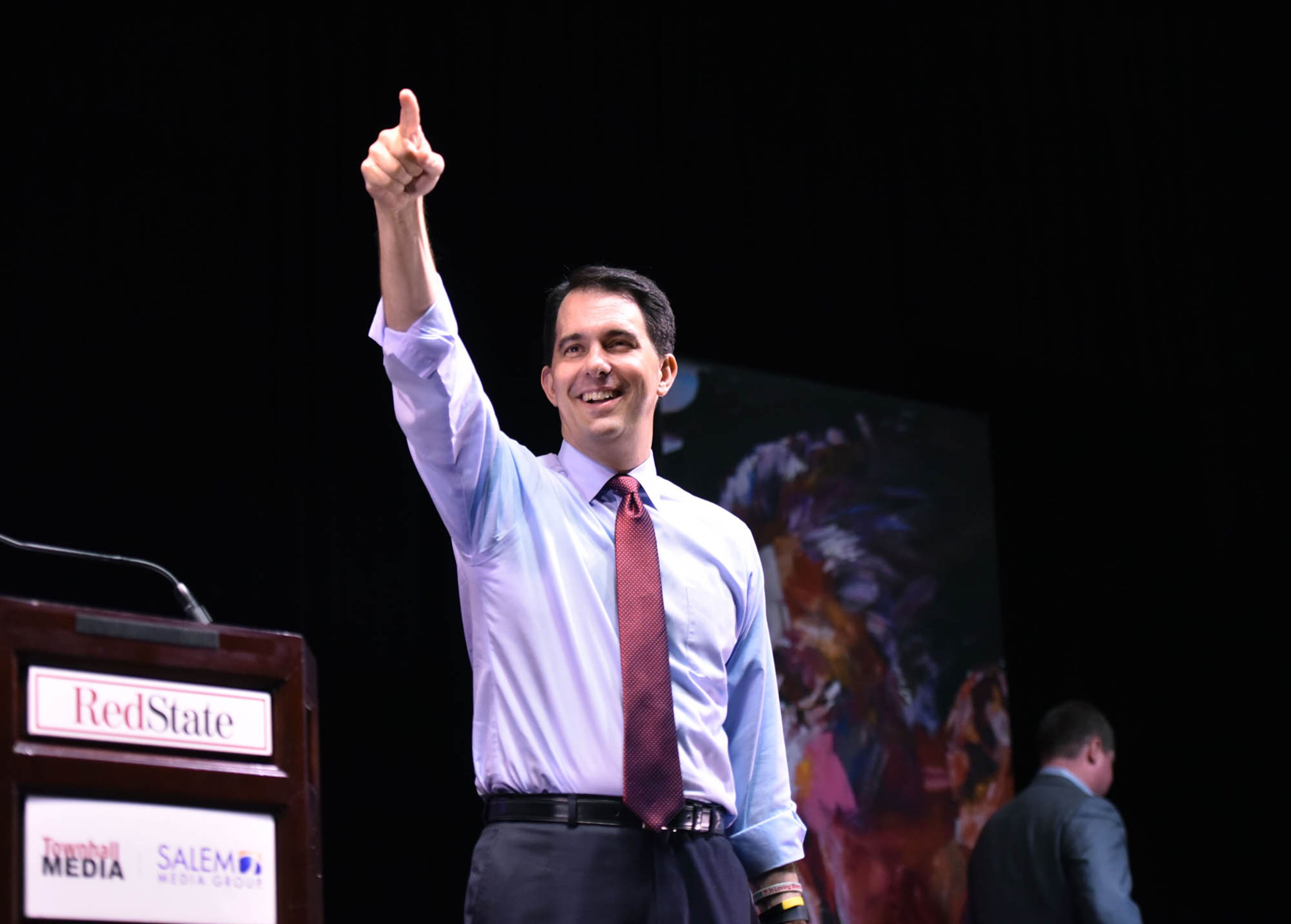 Wisconsin Gov. Scott Walker waves to attendees during the RedState Gathering at Intercontinental Buckhead Hotel on Saturday, August 8, 2015.