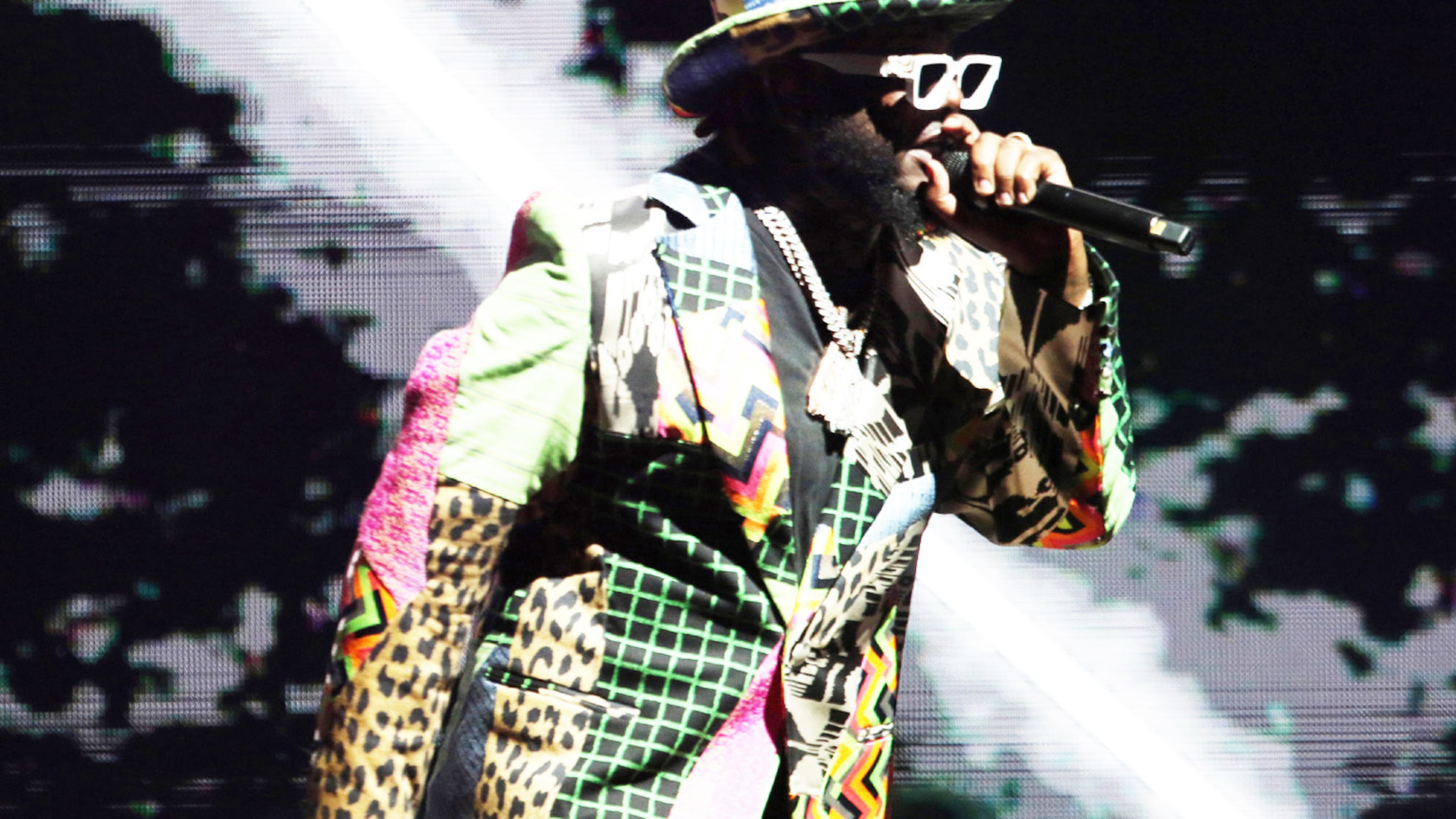 Atlanta rapper T-Pain, pictured performing at Lakewood Amphitheatre in 2024, is suing Konvict Entertainment, alleging he is owed almost $500,000 in unpaid royalties from record sales. (Robb Cohen for the AJC)
