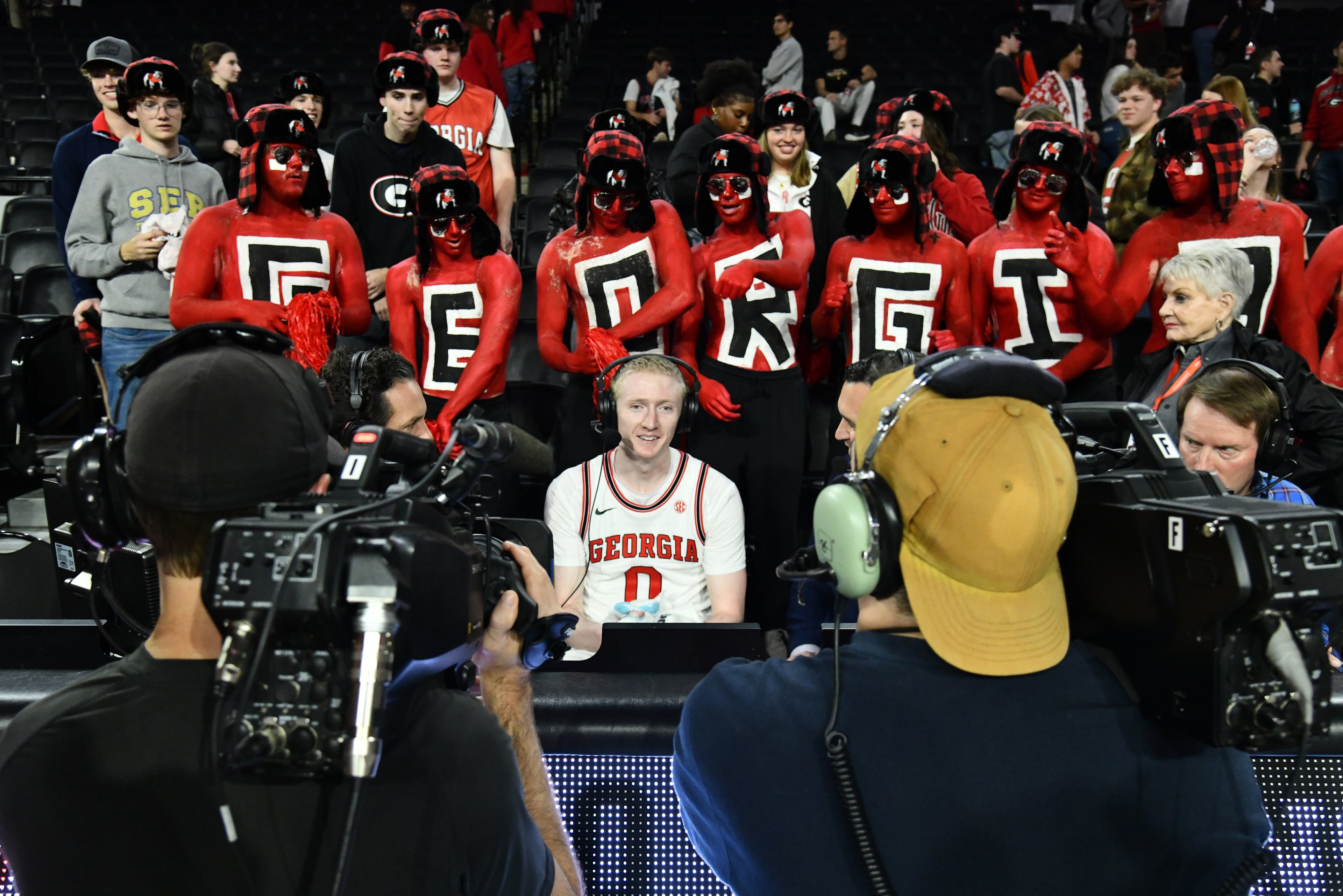 Georgia guard Blue Cain is interviewed after Georgia beat Arkansas in an NCAA college basketball game at Stegeman Coliseum, Saturday, Jan. 17, 2026, in Athens. Georgia won 90-76 over Arkansas. (Hyosub Shin/AJC)