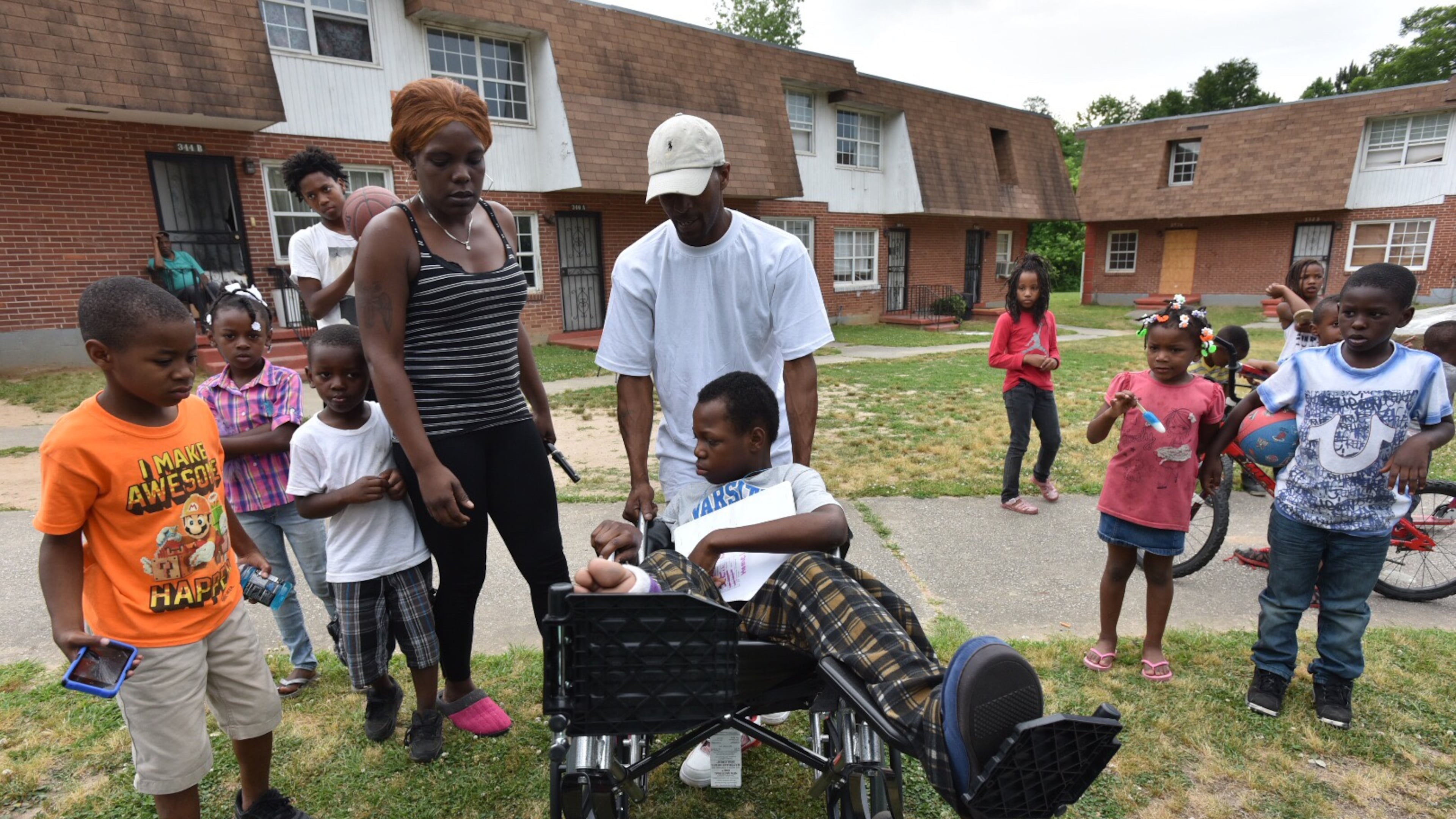 Timothy Hood, 13, returned home from the hospital Thursday after suffering serious injuries when a car hit him and two of his friends last month. One boy died after being taken off of life support. The other was also injured. JEREMY REDMON / JREDMON@AJC.COM