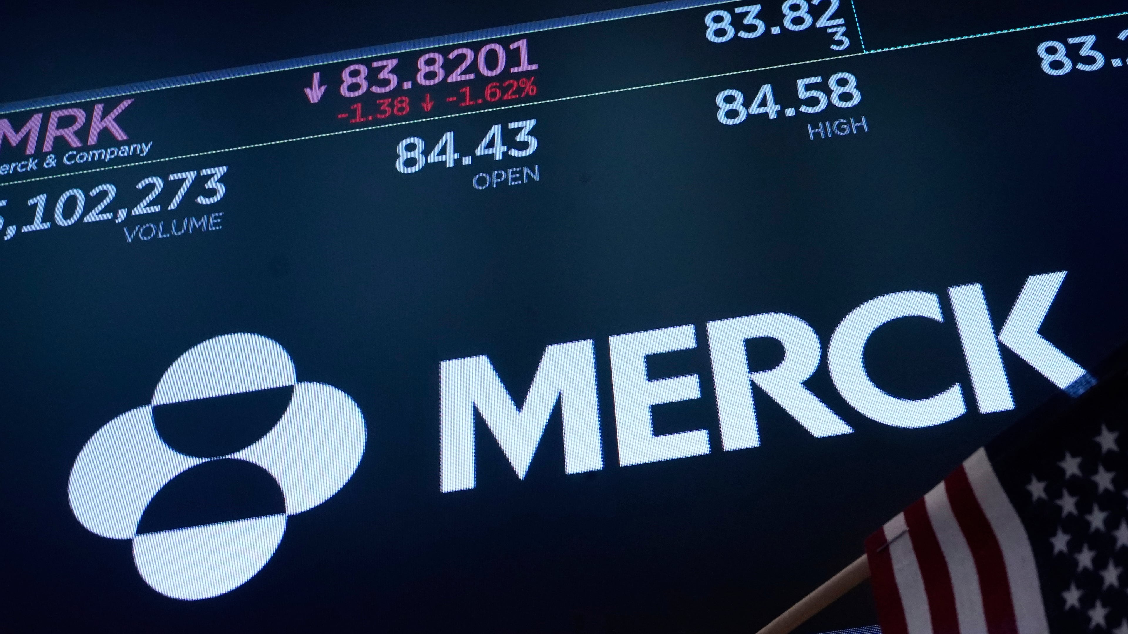 FILE - The logo for Merck appears above a trading post on the floor of the New York Stock Exchange, May 1, 2025. (AP Photo/Richard Drew, File)