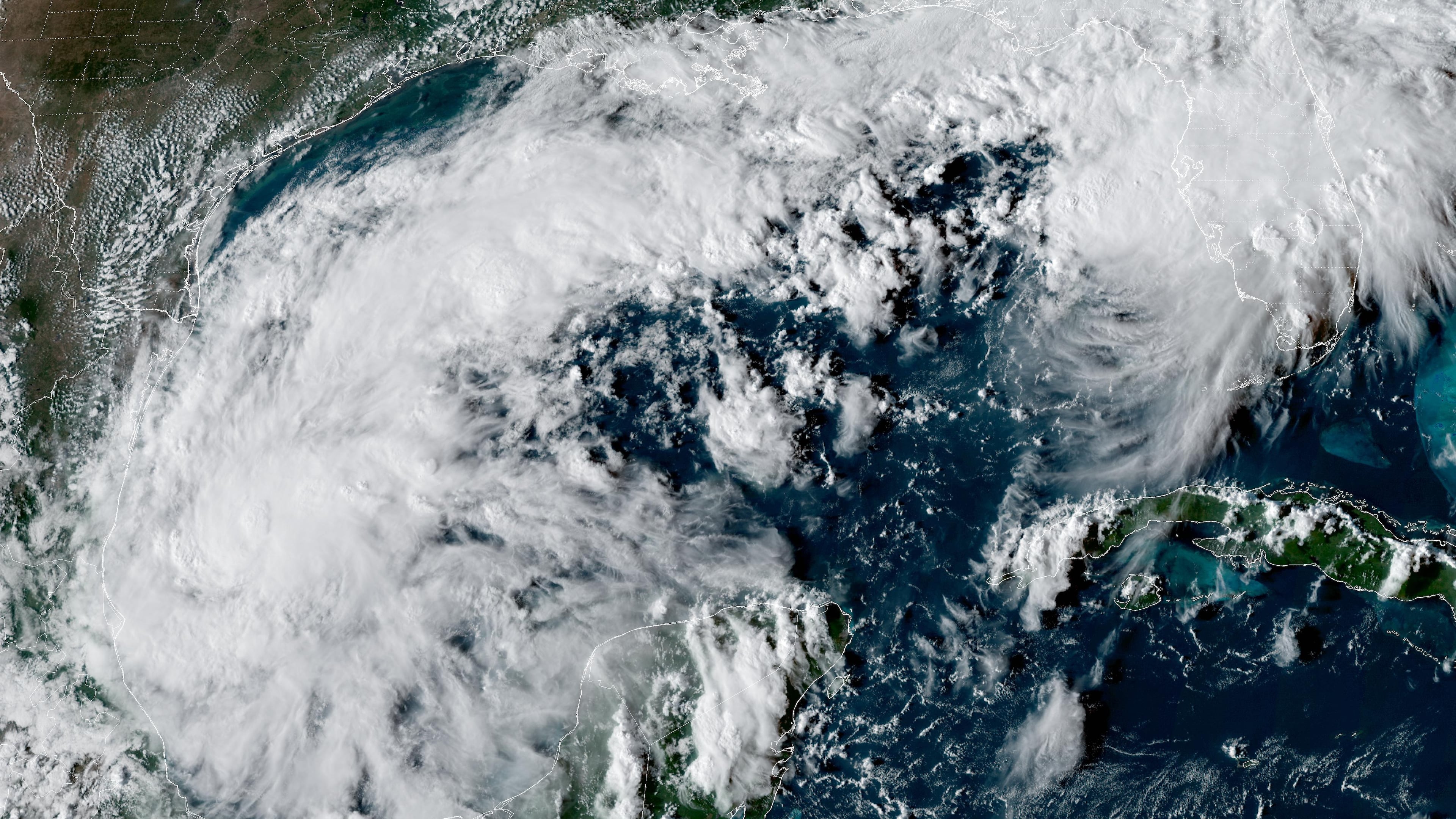 This satellite image from the National Oceanic and Atmospheric Administration shows Tropical Depression Nine forming over the Gulf of Mexico on Tuesday, Oct. 6, 2026. (NOAA via AP)