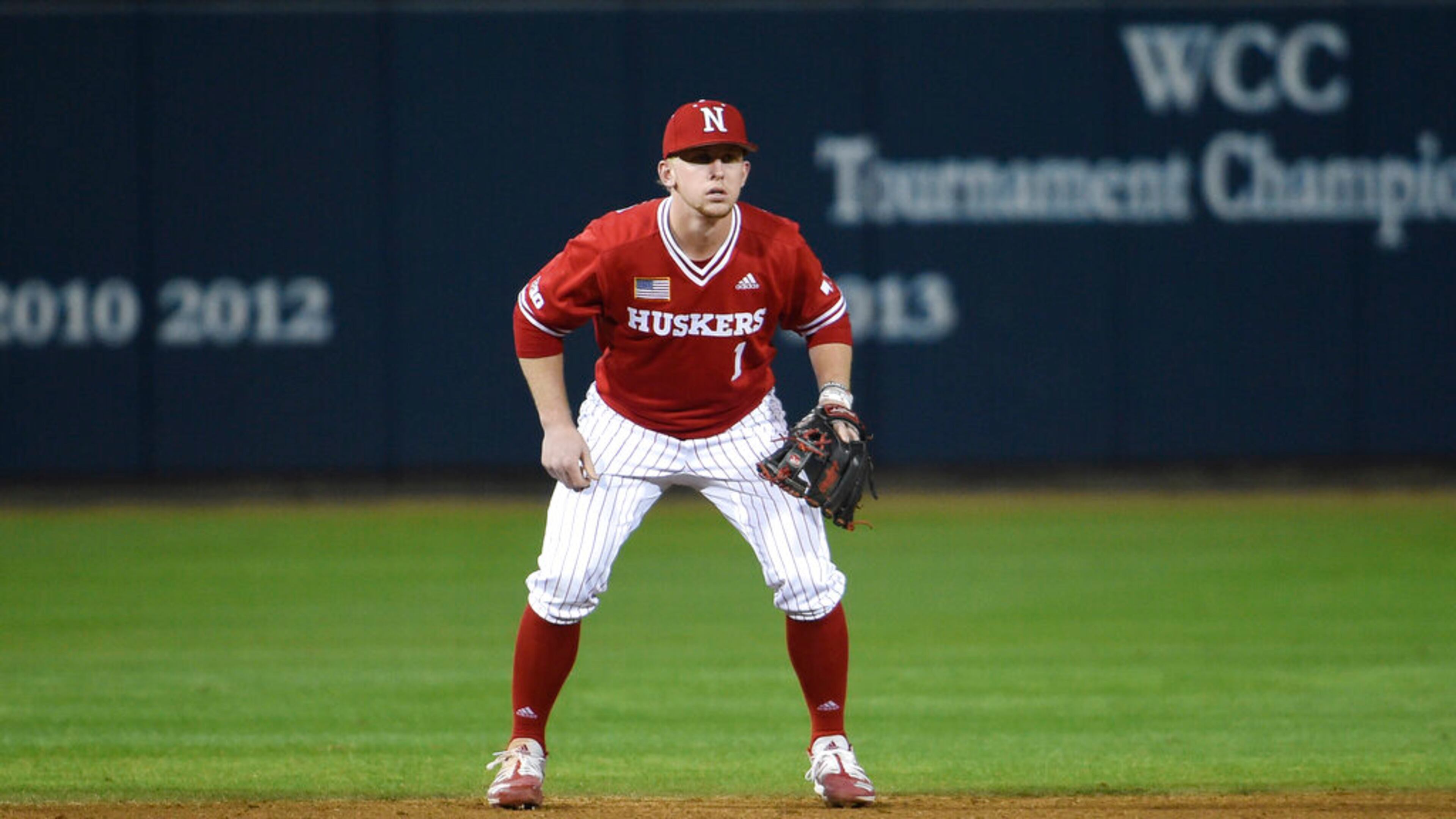 Spencer Schwellenbach handles shortstop for Nebraska during an NCAA baseball game against San Diego on Friday, Feb. 21, 2020, in San Diego. (AP Photo/Denis Poroy)