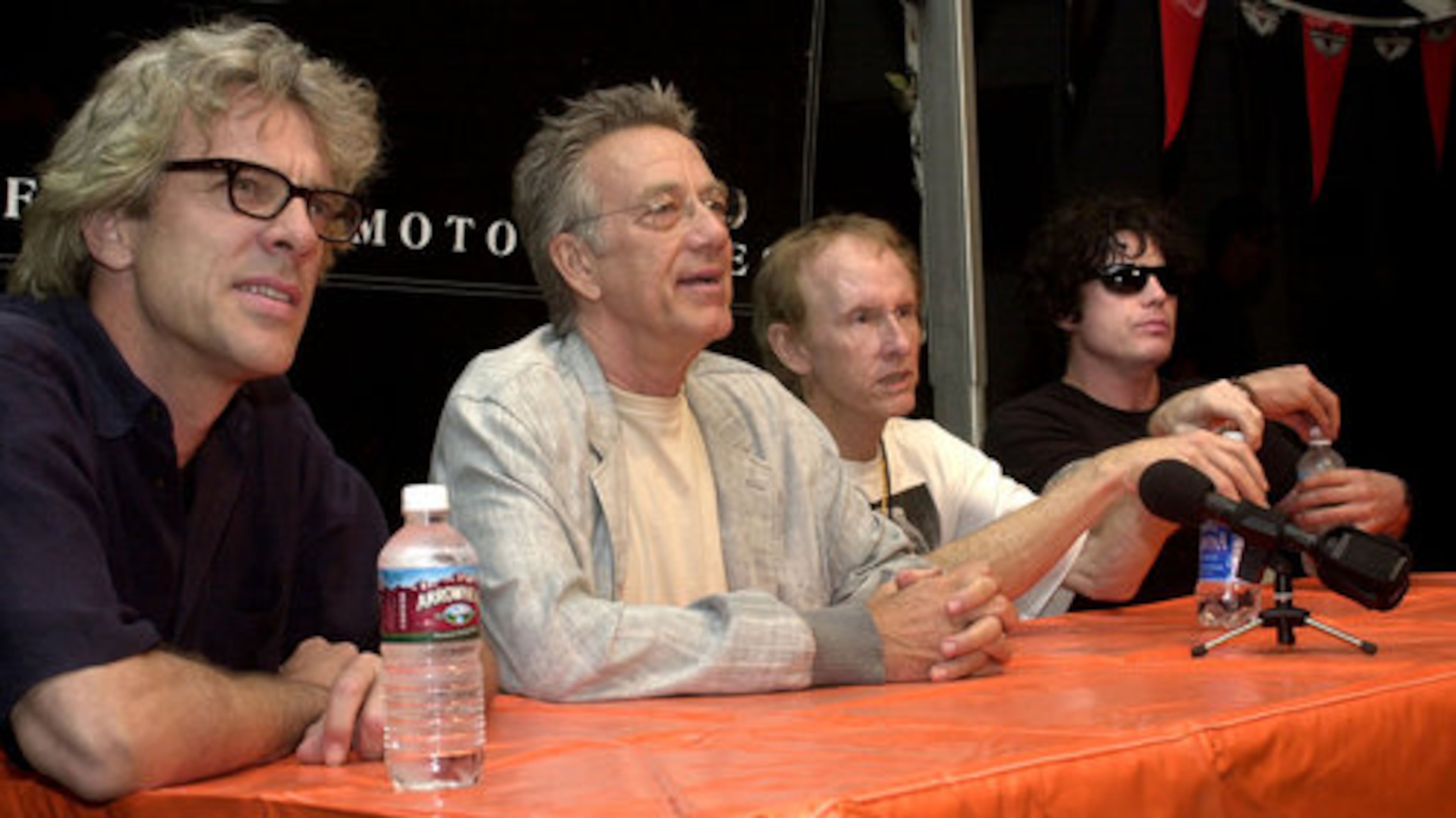 The Doors live on, even without their charismatic lead singer. The Doors, from left, former Police drummer Stewart Copeland, with original members keyboardist Ray Manzarek and guitarist Robby Krieger, along with The Cult's lead singer Ian Astbury are shown in this Sept. 6, 2002 file photo. The two original members of the Doors continue to tour as Manzarek-Krieger.