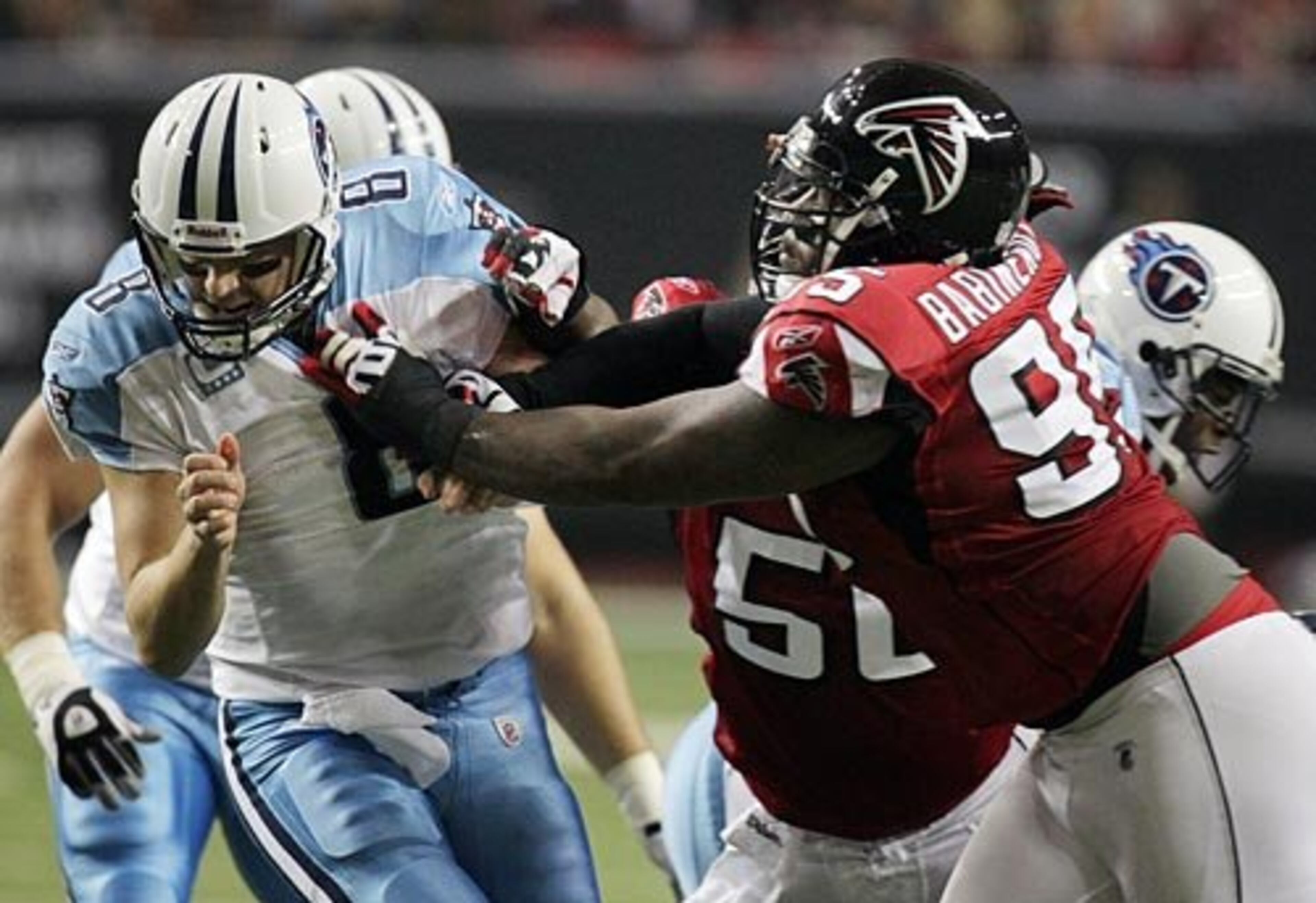 Falcons defender Jonathan Babineaux gets some pressure on Titans quarterback Matt Hasselbeck.