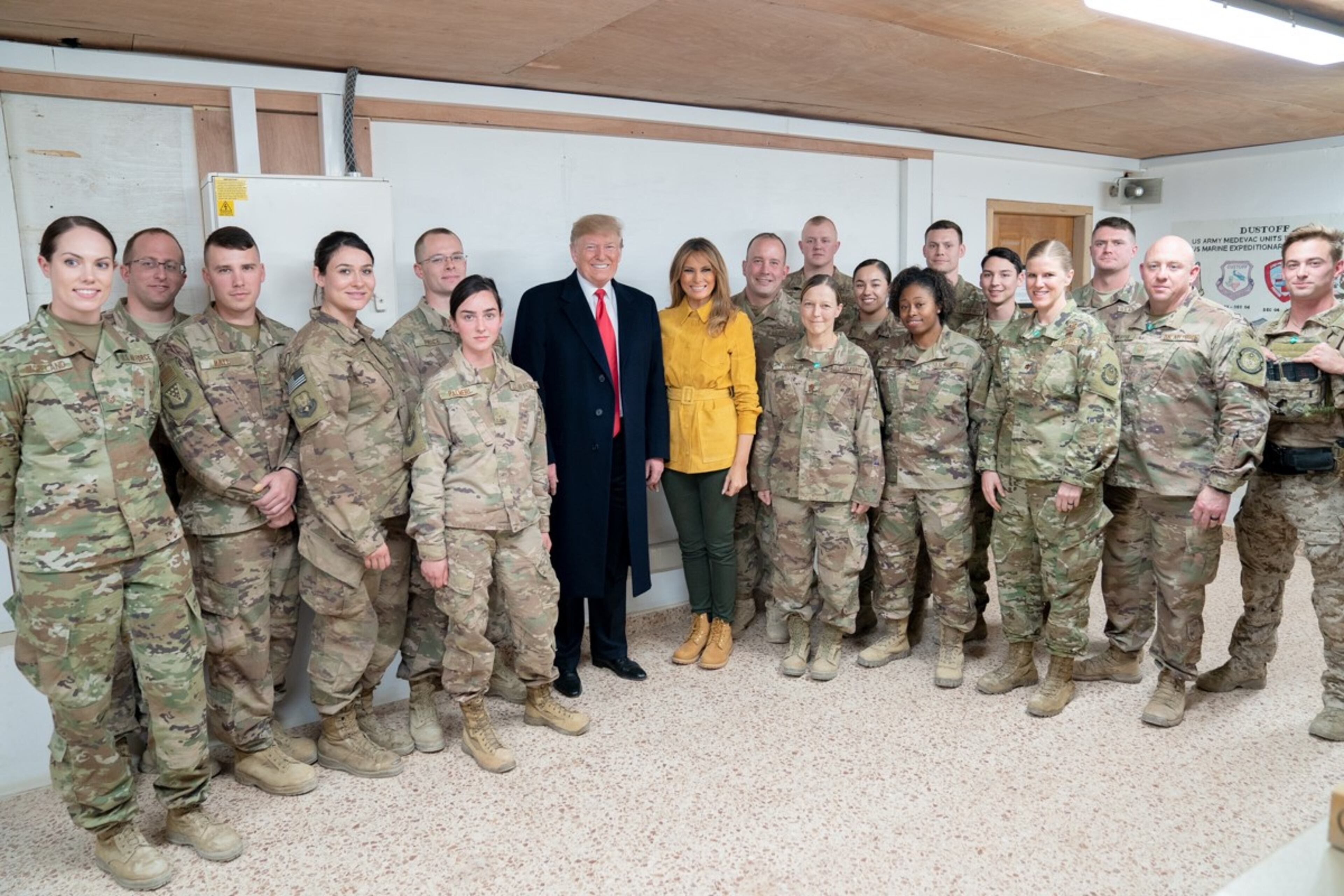President Donald J. Trump and First Lady Melania Trump pose for a photo with U.S. Pararescue personnel Wednesday, December 26, 2018, at the Al-Asad Airbase in Iraq.