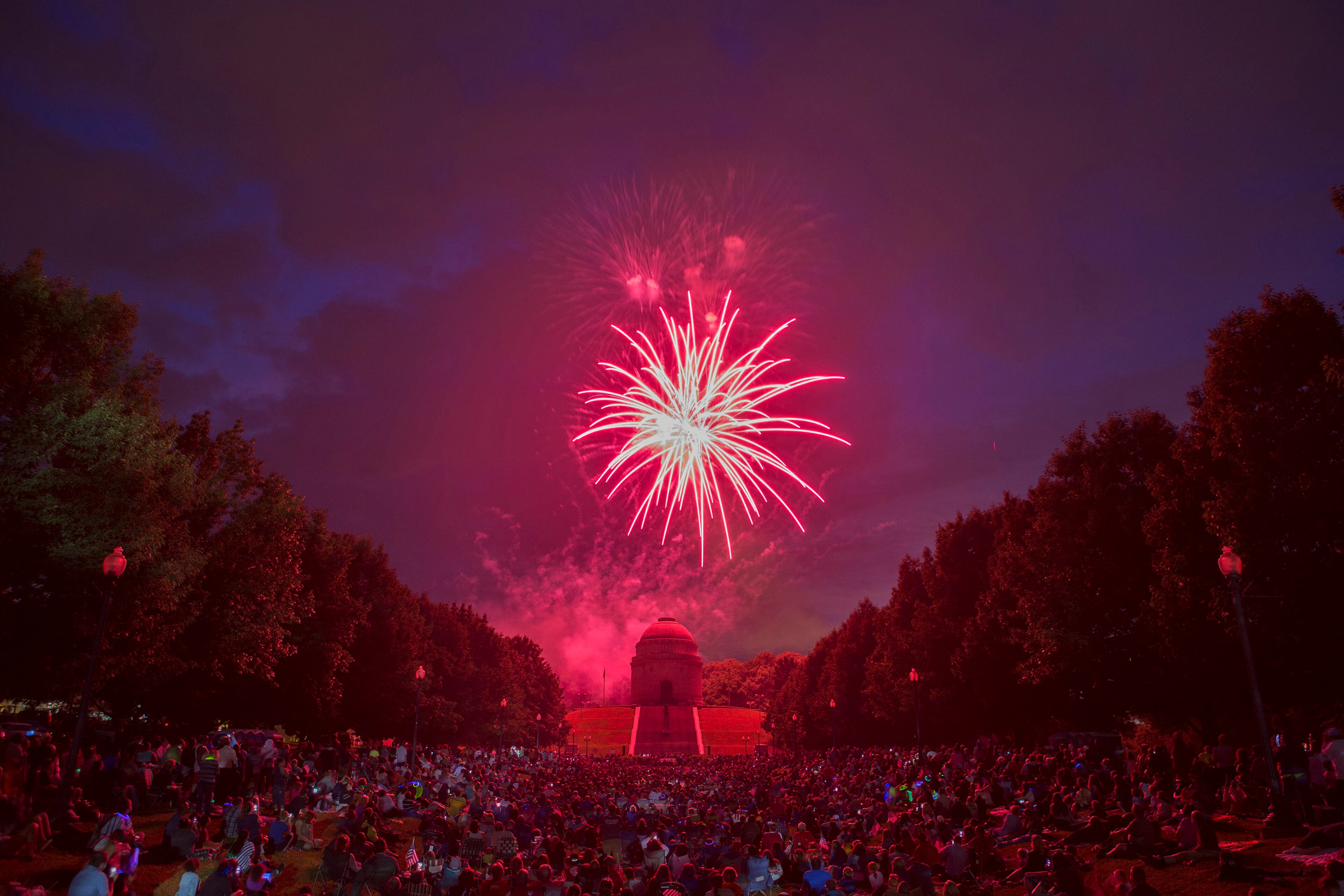 Fireworks are set off during the Canton, Ohio, Monumental Fourth Celebration at the William McKinley Presidential Library and Museum on Sunday, July 3, 2016. (Bob Rossiter/The Canton Repository via AP)