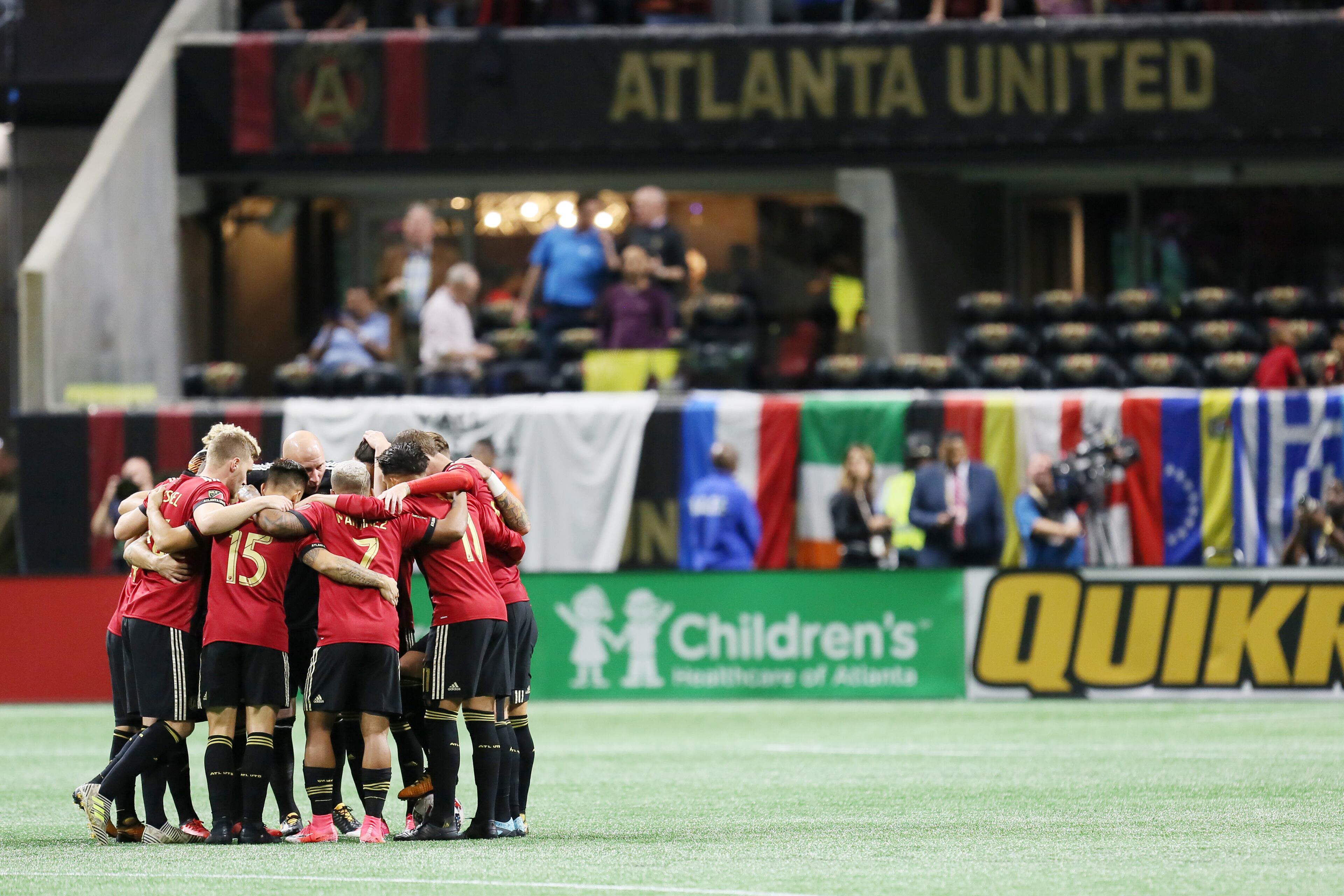 October 26, 2017. Atlanta United players gather in the field during the first round of the MLS playoff match at Mercedes-Benz stadium.