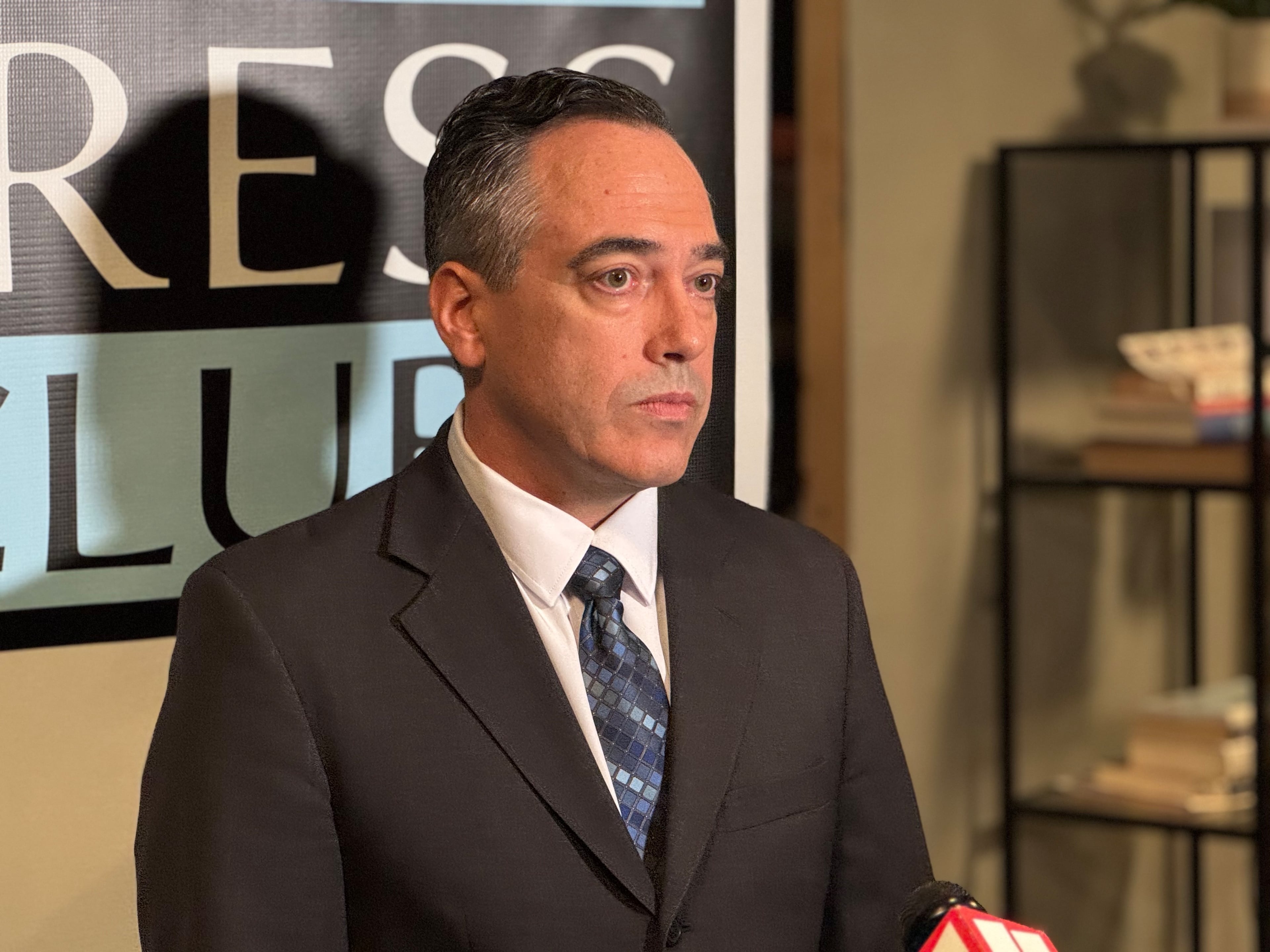Democrat Peter Hubbard speaks to reporters after a debate held at the studios of 90.1 FM WABE on Wednesday, Oct. 8, 2025. Hubbard was the only one of the four candidates seeking election to the Georgia Public Service Commission, the state's utility regulator, that attended the debate. (Drew Kann/AJC)