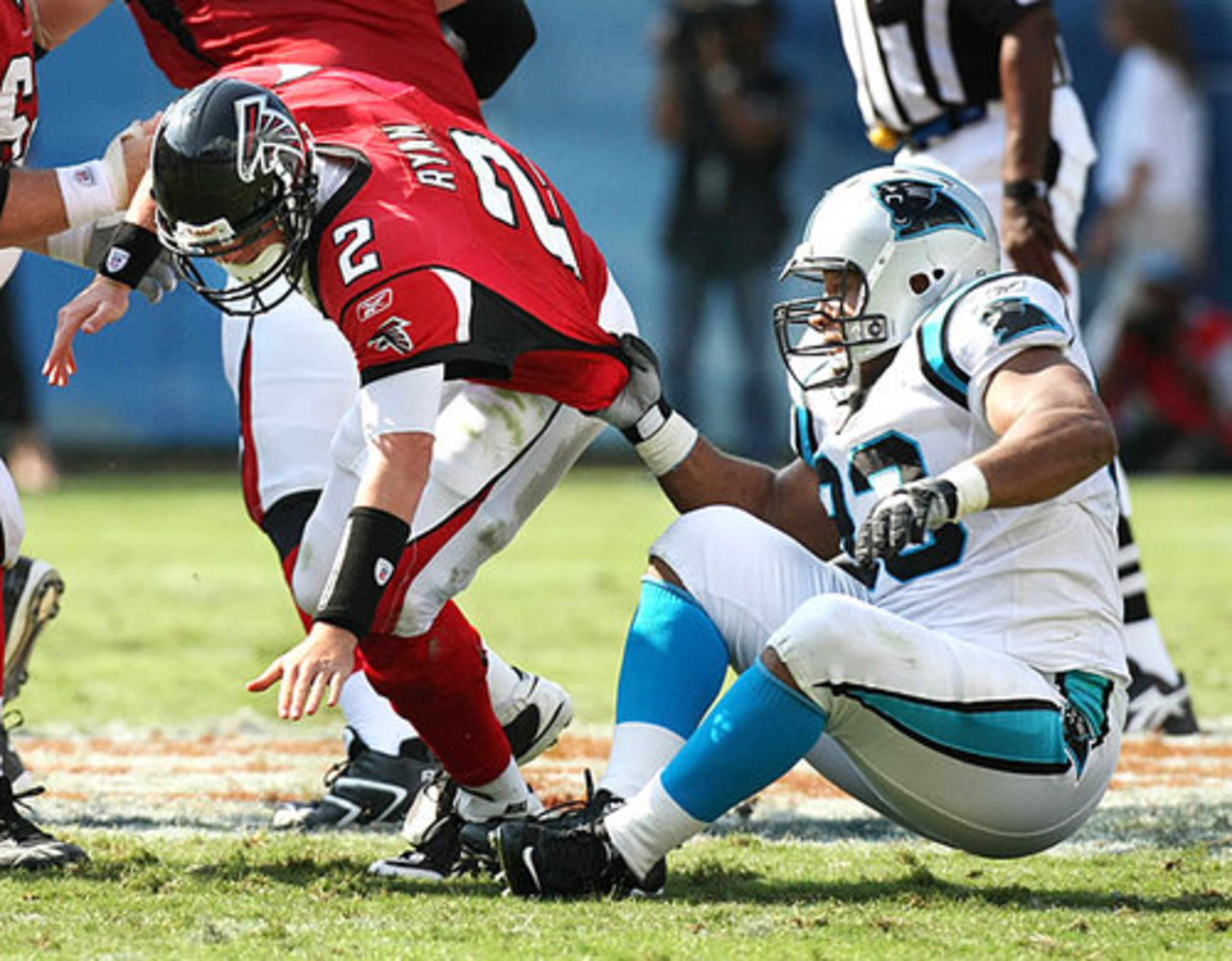 Ryan took hit after hit, including this illegal one from Panthers defensive tackle Darwin Walker.