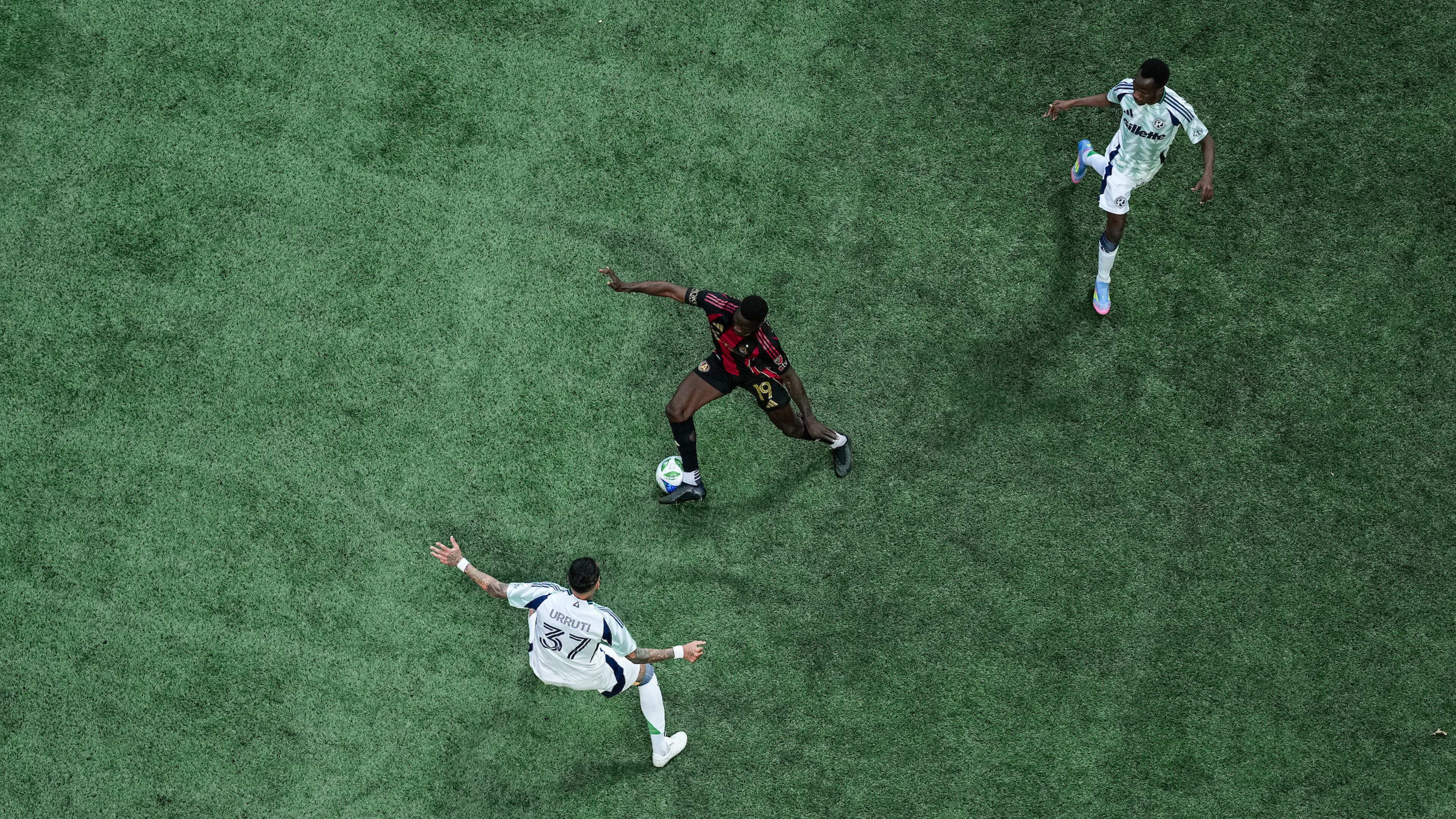 Atlanta United forward Emmanuel Latte Lath #19 dribbles during the match against the New England Revolution at Mercedes-Benz Stadium in Atlanta, GA on Saturday April 12, 2025. (Photo by Jay Bendlin/Atlanta United)