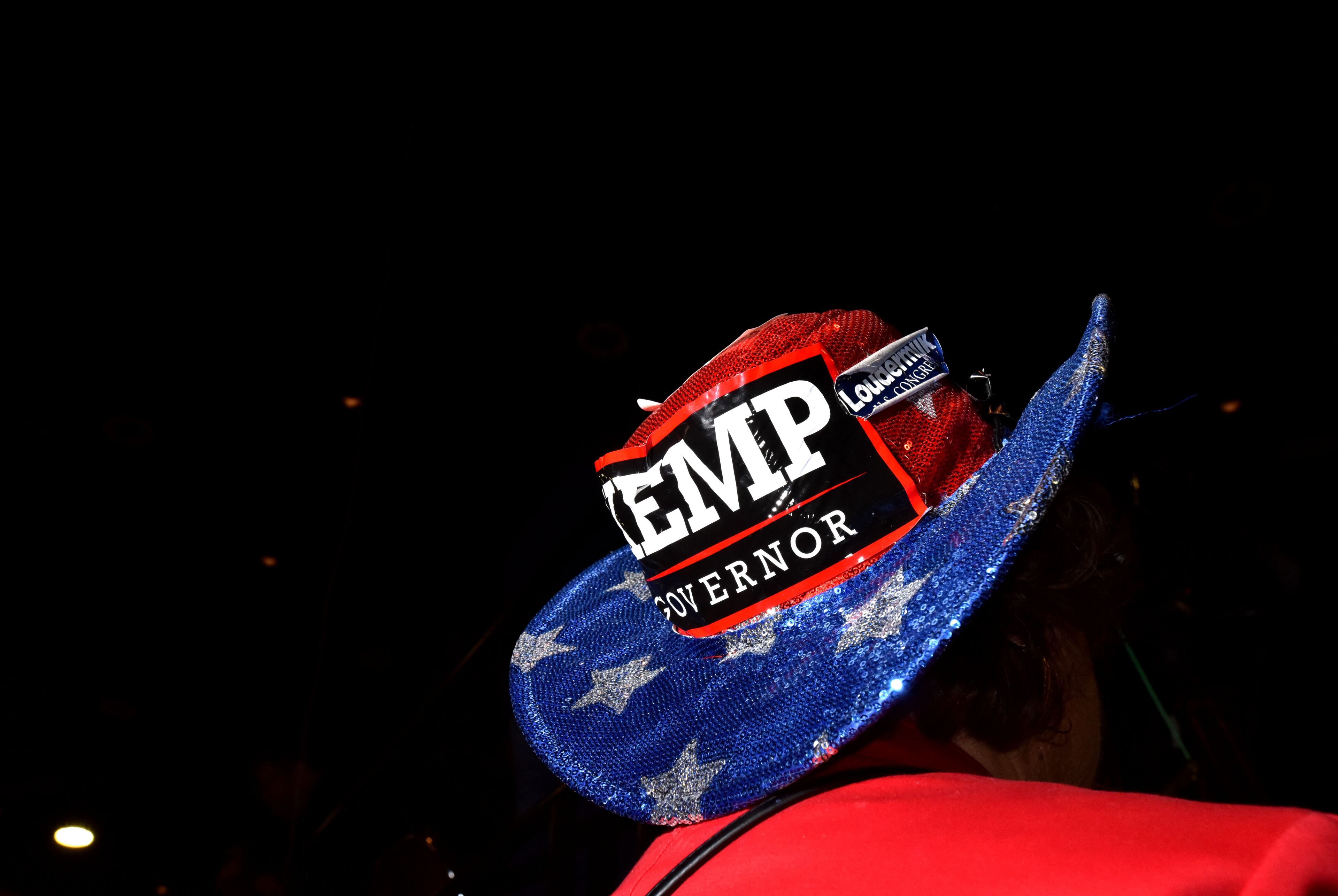 November 1, 2018 Dalton - Nancy Burton decorates her hat to support GOP gubernatorial candidate Brian Kemp at Dalton Convention Center in Dalton on Thursday, November 1, 2018. The nationally-watched Georgia race for governor is about to get even more attention. Vice President Mike Pence is headed to Georgia on Thursday for a trio of events in conservative areas for Brian Kemp. Democrats are countering with a visit by Oprah Winfrey, who will appear with Stacey Abrams at a pair of town hall meetings. HYOSUB SHIN / HSHIN@AJC.COM