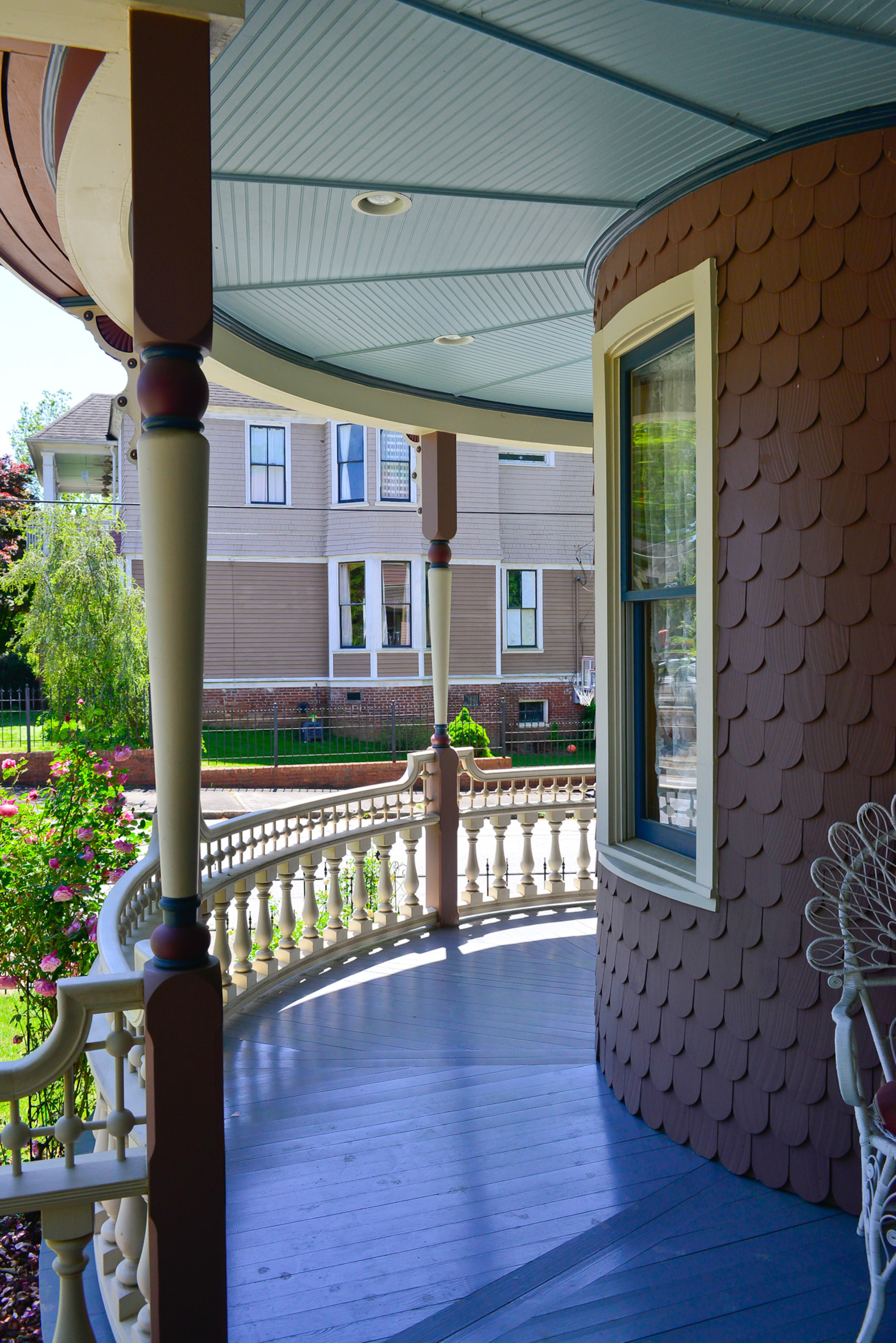 The couple moved into the Grant Park home in 2002, but have continued to add onto their front porch, which now has a completed balustrade along with Victorian-style brackets and gingerbread trim.