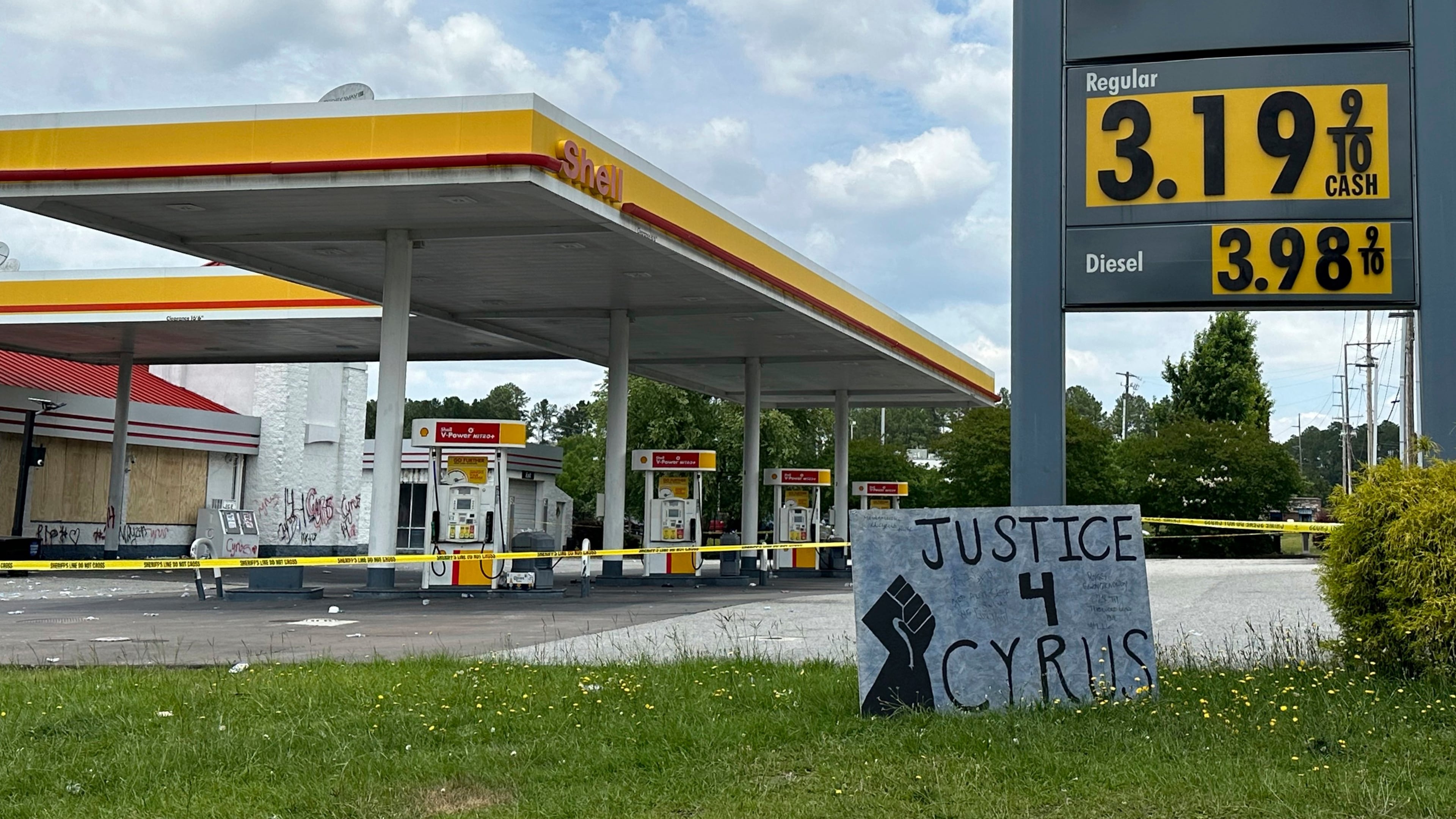 FILE - A sign calling for justice is for Cyrus Carmack-Belton is seen outside a gas station June 1, 2023, in Columbia, S.C. (AP Photo/Jeffrey Collins, File)