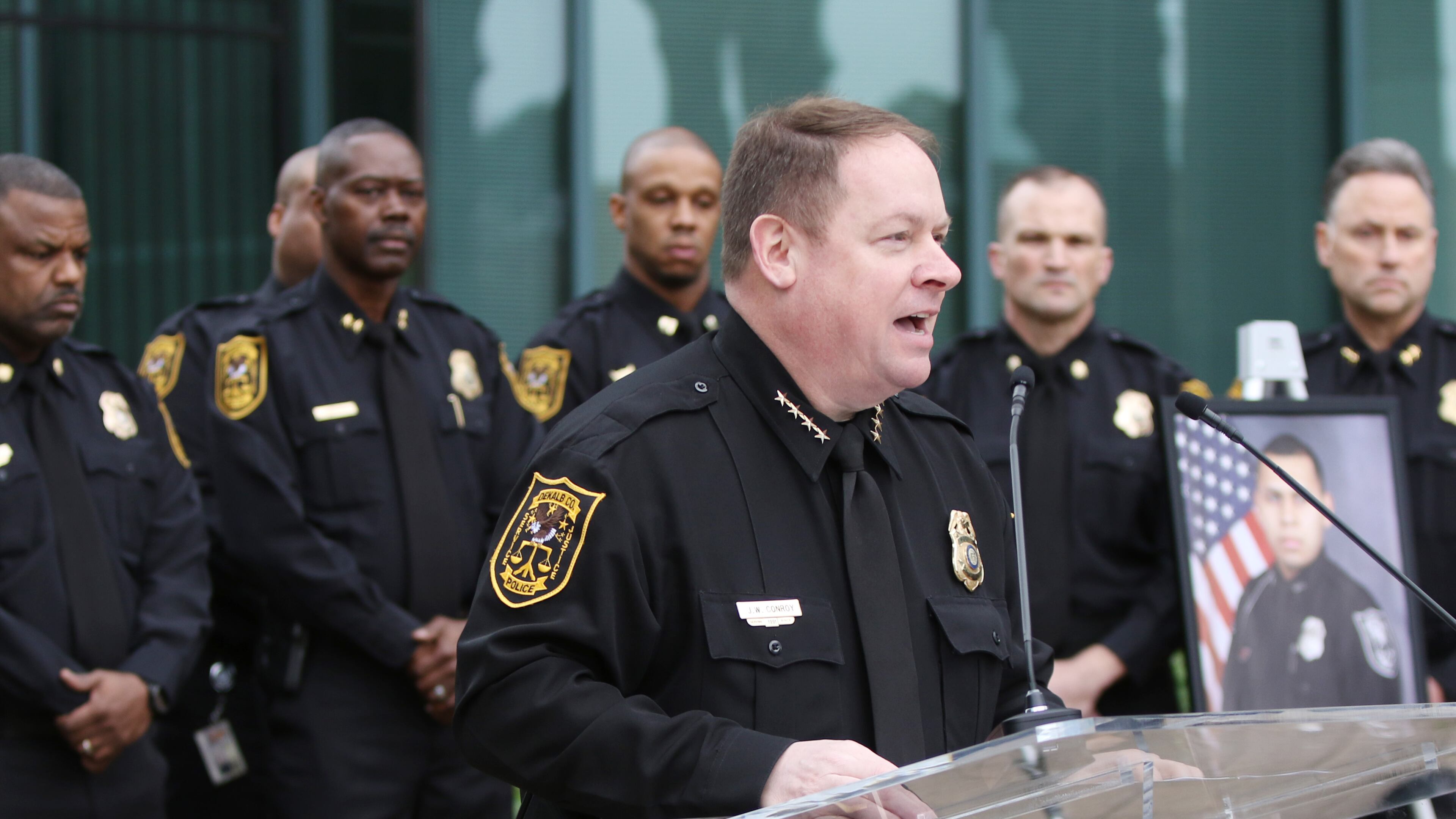 DeKalb County police’s former Chief James Conroy speaks at a ceremony to honor Master Police Officer Norman Larsen and DeKalb County police K-9 Indi outside of DeKalb County police headquarters in Tucker, Georgia on Wednesday, March 13, 2019.