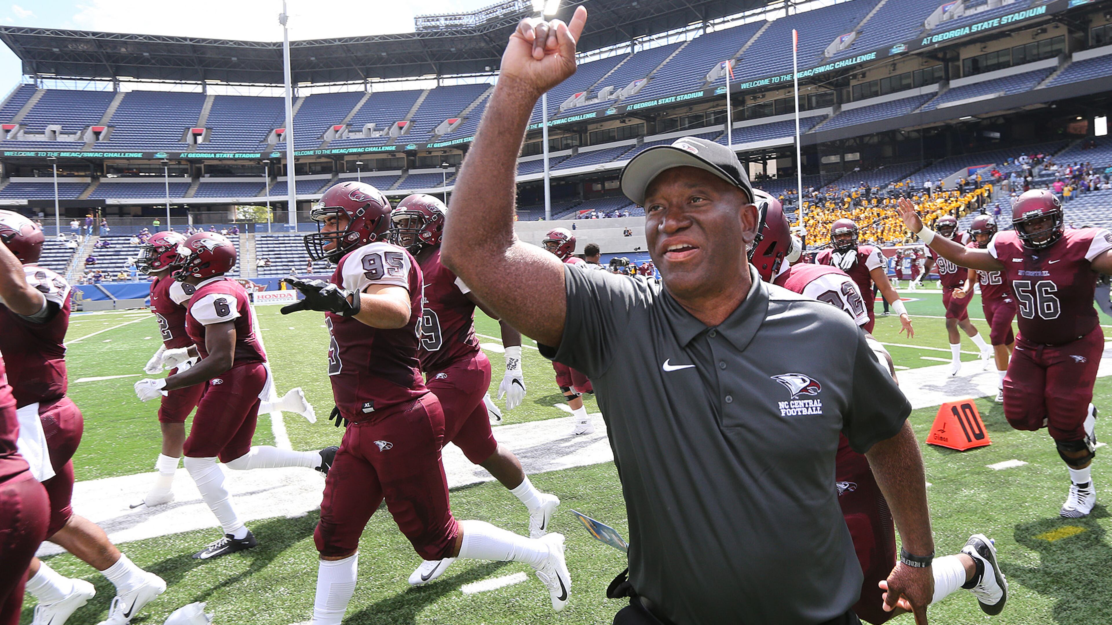North Carolina Central head coach Granville Eastman and his team take the field to play Prairie View A&M in the MEAC-SWAC Challenge Sunday, Sept. 2, 2018, at Georgia State Stadium in Atlanta.