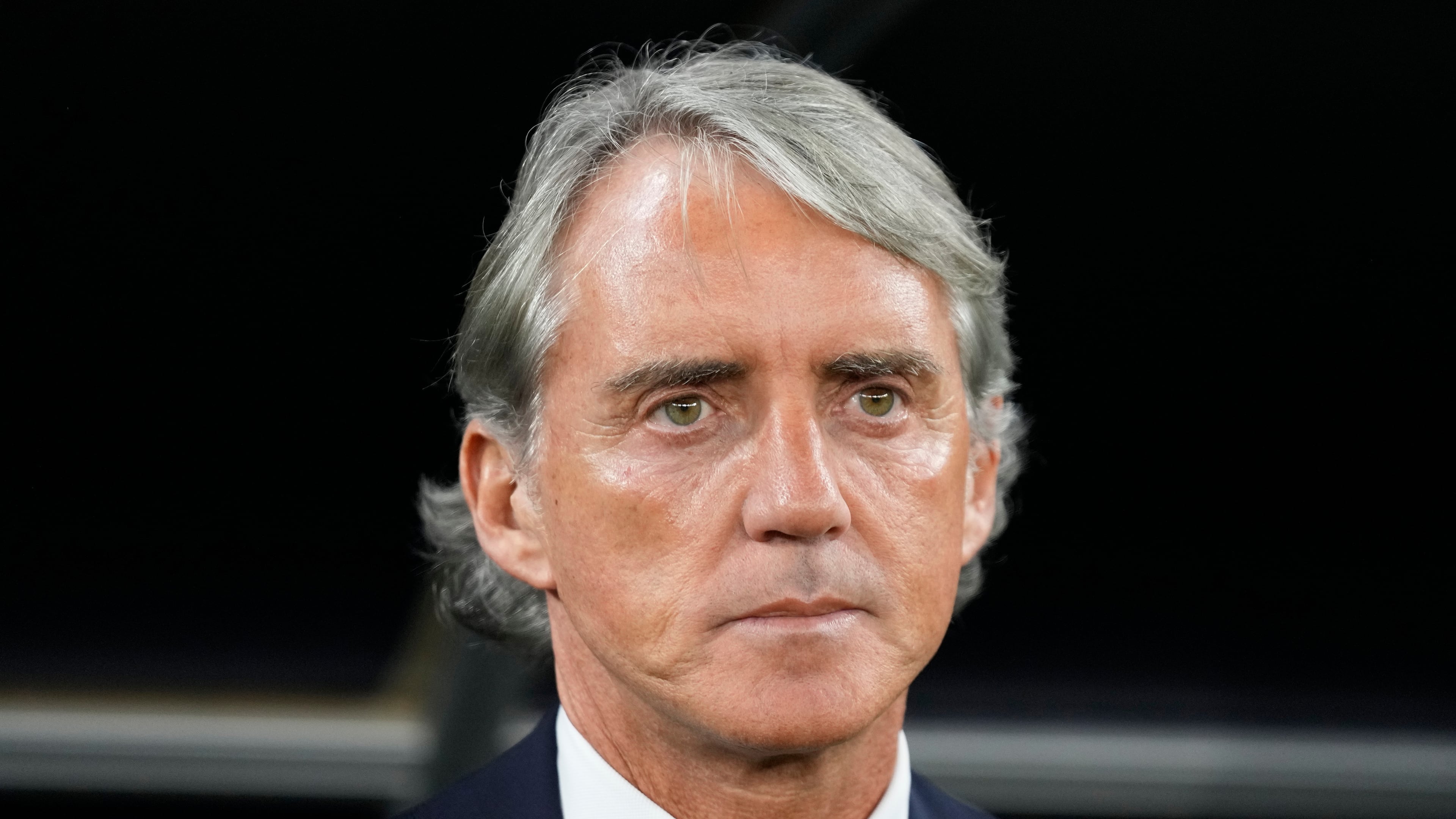 FILE - Saudi Arabia's head coach Roberto Mancini stands for the national anthems ahead of the Asian Cup Group F soccer match between Saudi Arabia and Thailand at Education City Stadium, in Al Rayyan, Qatar, Thursday, Jan. 25, 2024. (AP Photo/Aijaz Rahi, file)