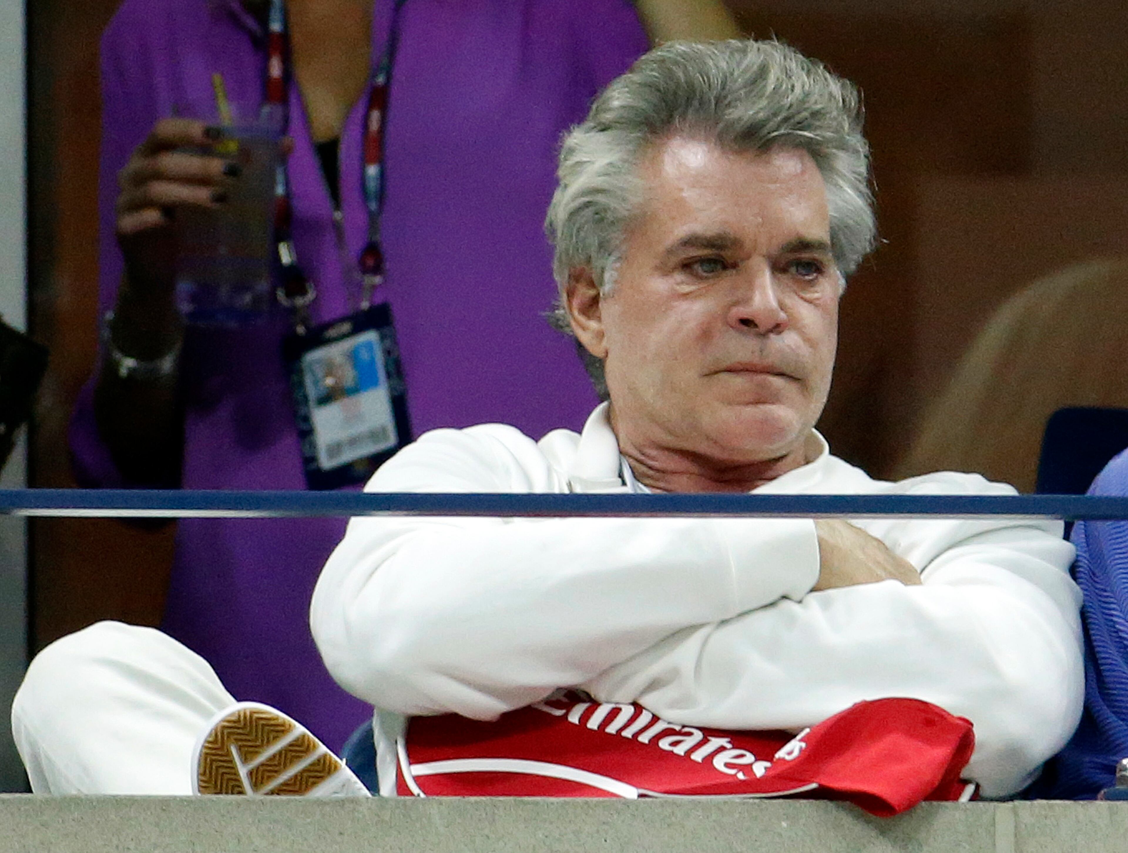 Actor Ray Liotta watches the second set of a match between Andy Murray, of Britain, and Thomaz Bellucci, of Brazil, during the third round of the U.S. Open tennis tournament in New York, Saturday, Sept. 5, 2015. (AP Photo/Julio Cortez)