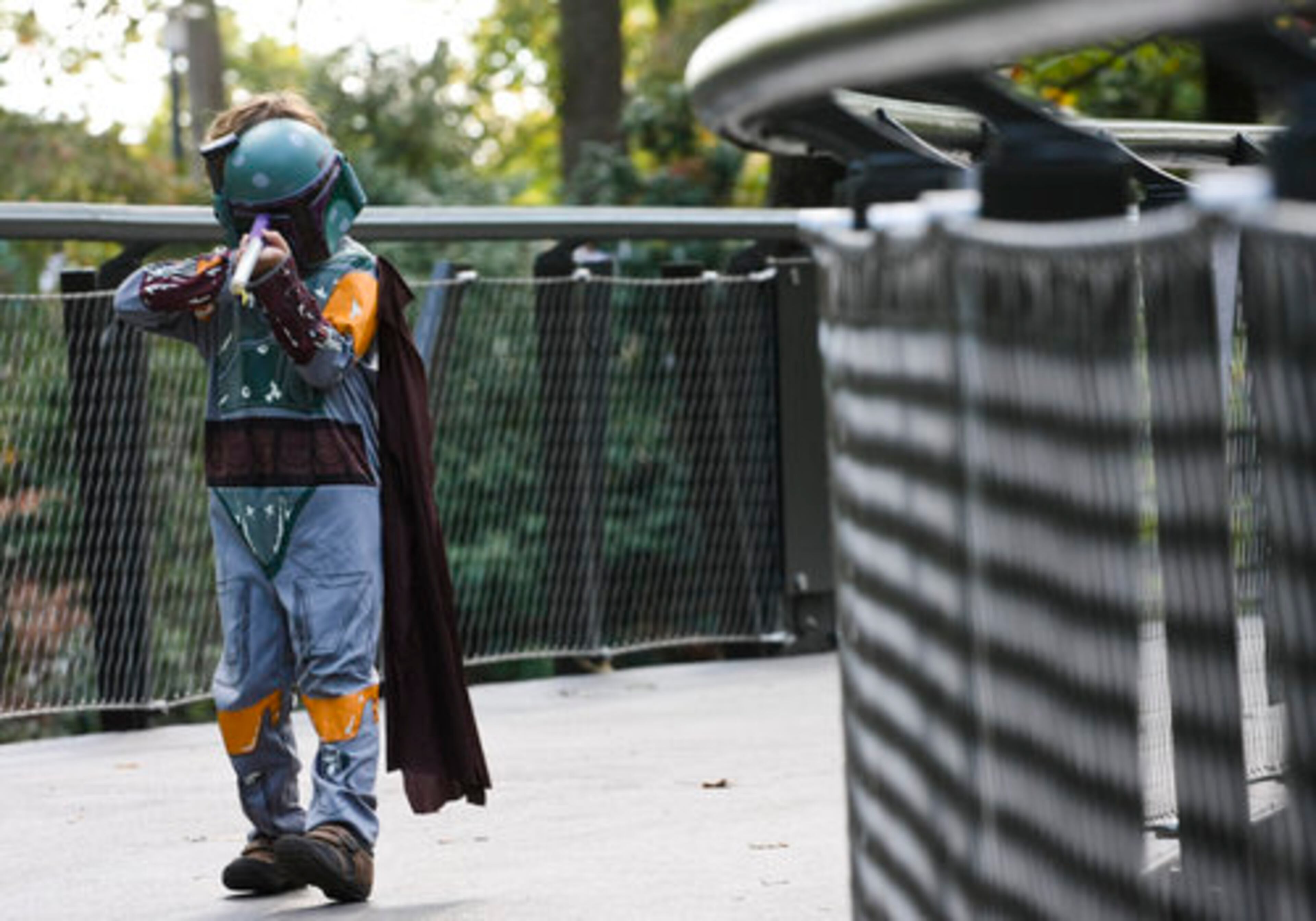 Six-year-old Jacob Leavey in his Boba Fett attire takes aim at all challengers during the kiddie costume parade during Atlanta Botanical Garden's annual Goblins in the Garden, Sunday, October 24, 2010.