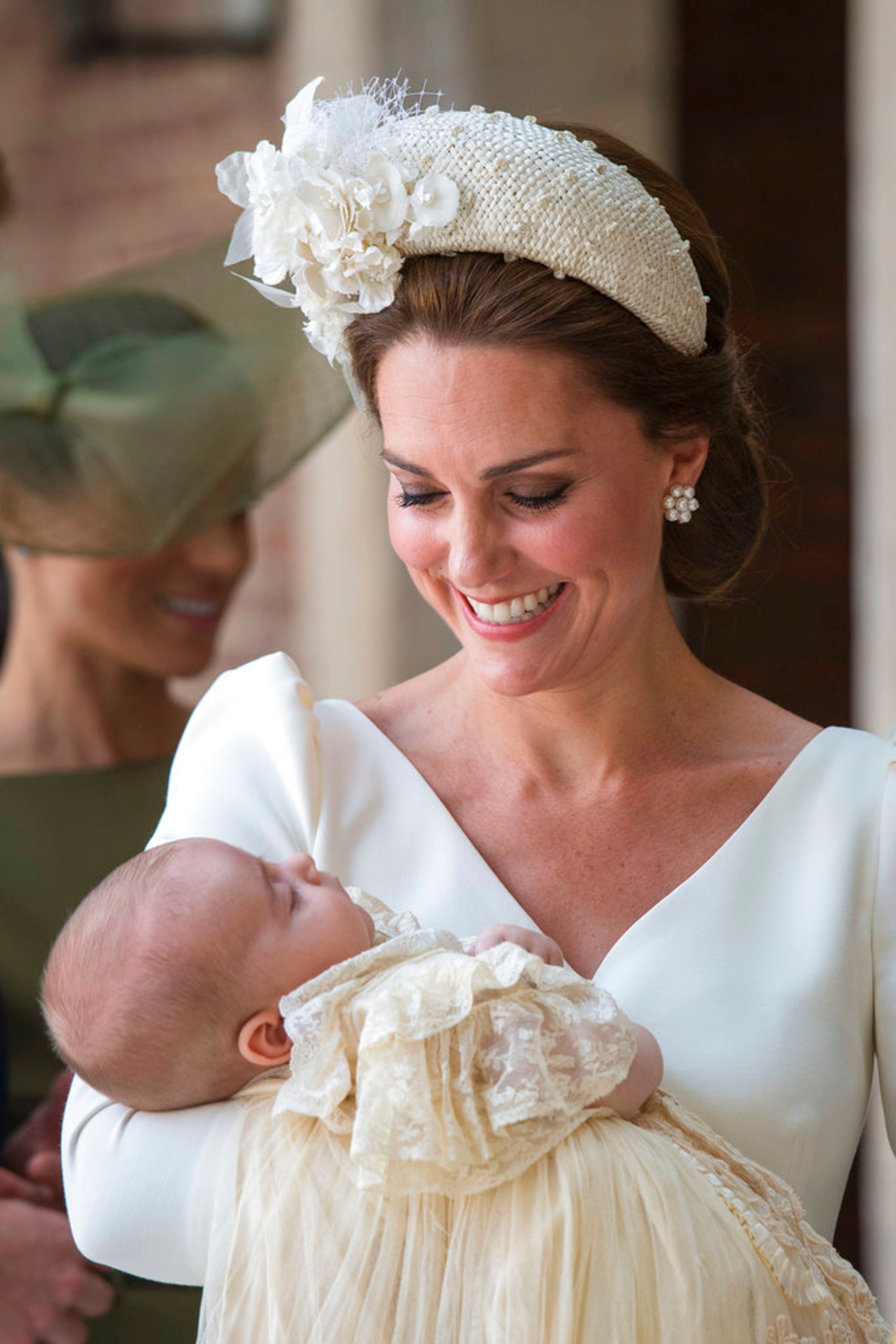Kate, Duchess of Cambridge carries Prince Louis as they arrive for his christening service at the Chapel Royal, St James's Palace, London, Monday, July 9, 2018. (Dominic Lipinski/Pool Photo via AP)