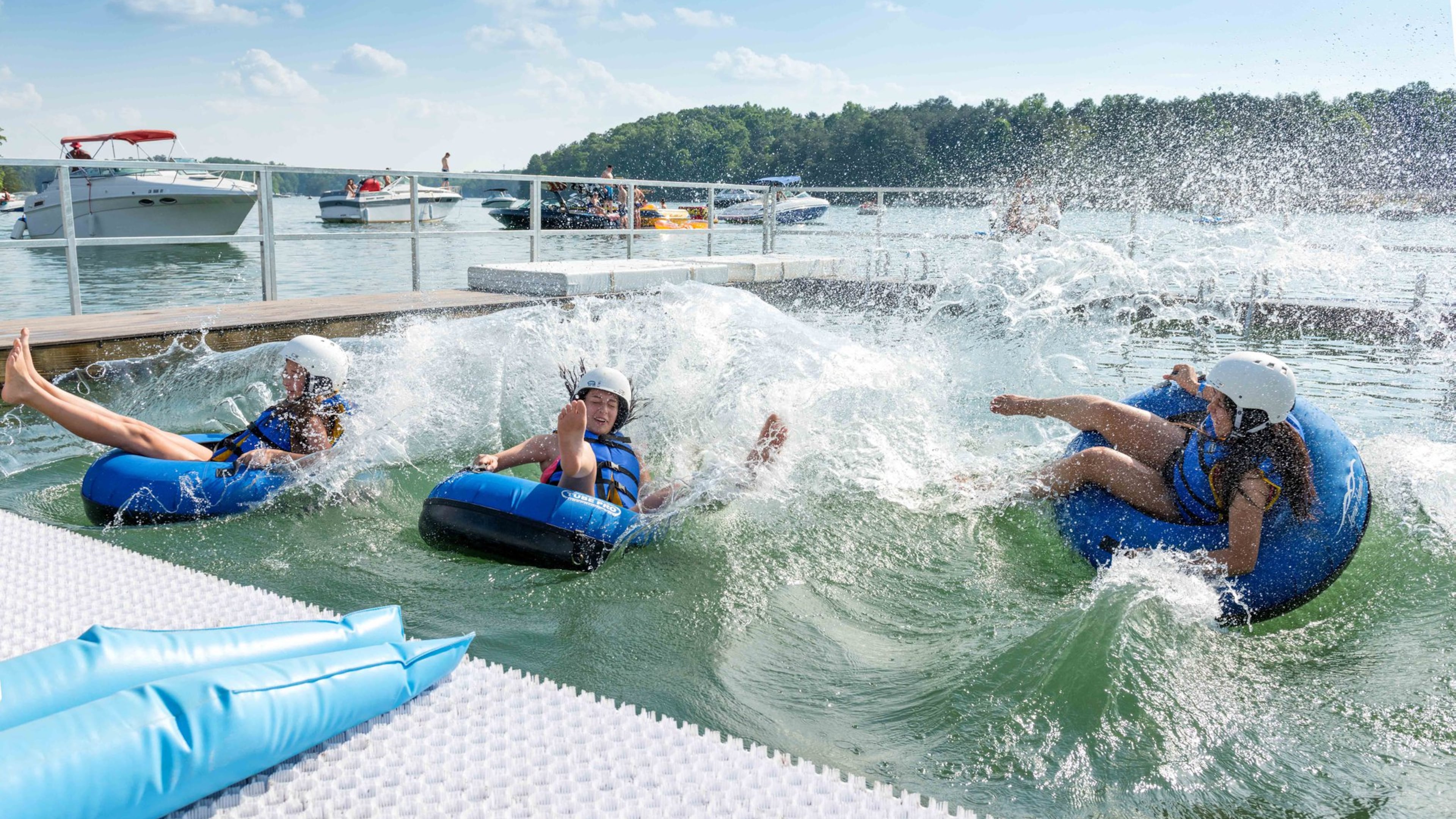 The new four-lane CAT4 Tube Slide at LanierWorld sends racers into Lake Lanier. (LanierWorld)