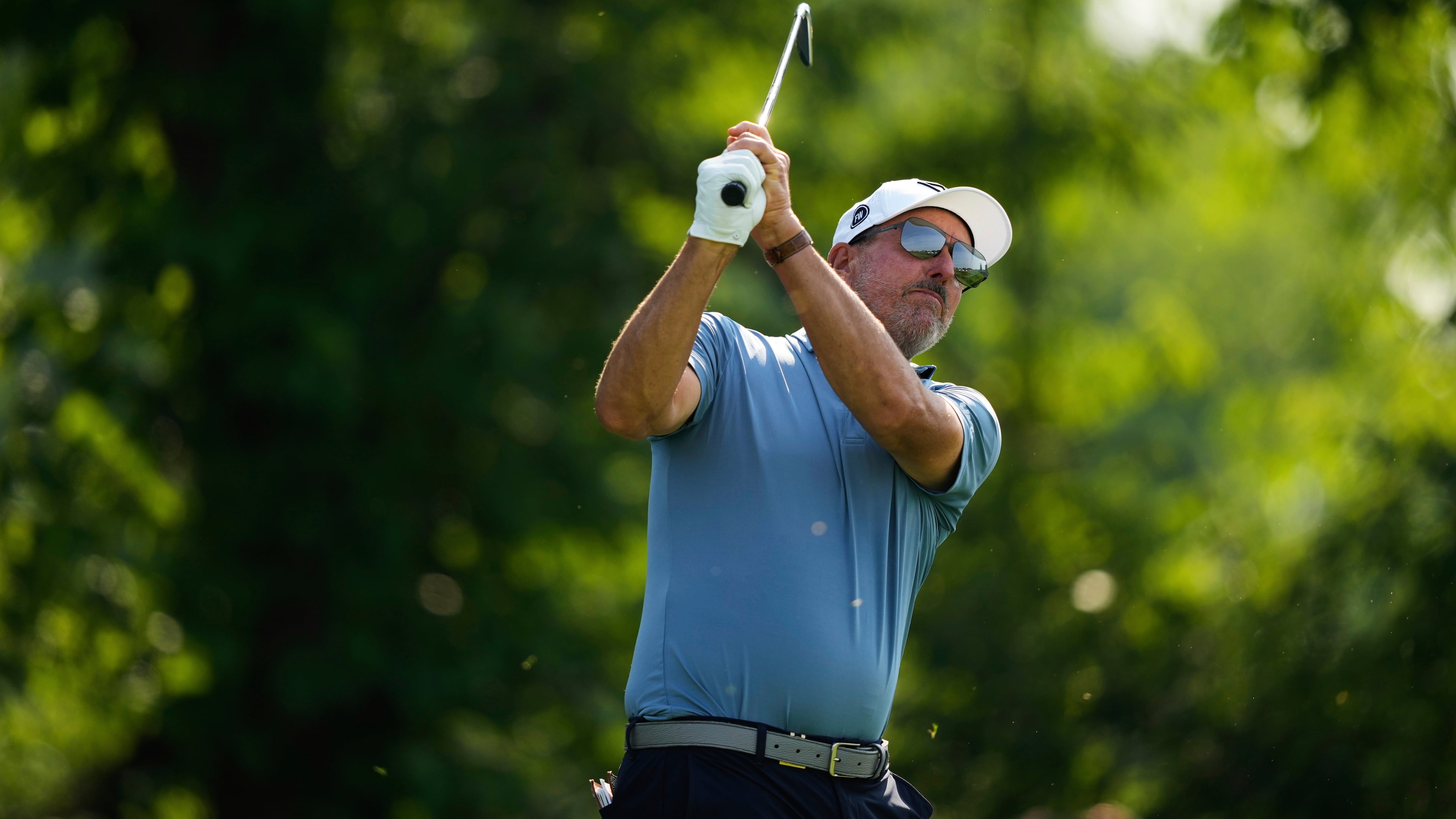 FILE - Phil Mickelson tees off on the 13th hole during the first round of the U.S. Open golf tournament at Oakmont Country Club, June 12, 2025, in Oakmont, Pa. (AP Photo/Carolyn Kaster, File)