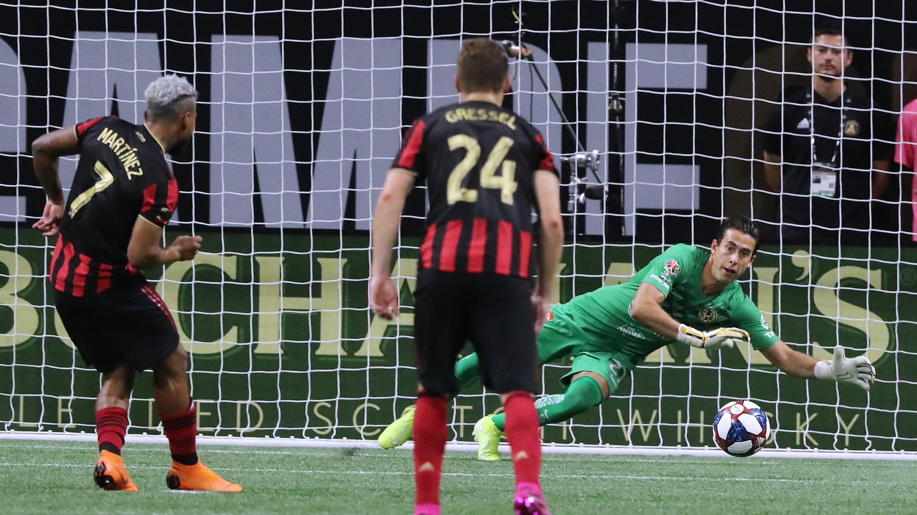 August 14, 2019 Atlanta: Atlanta United forward Josef Martinez has his penalty kick blocked by Club America goalkeeper Oscar Jimenez as Julian Gressel looks on during the first half in the Campeones Cup on Wednesday, August 14, 2019, in Atlanta. Curtis Compton/ccompton@ajc.com