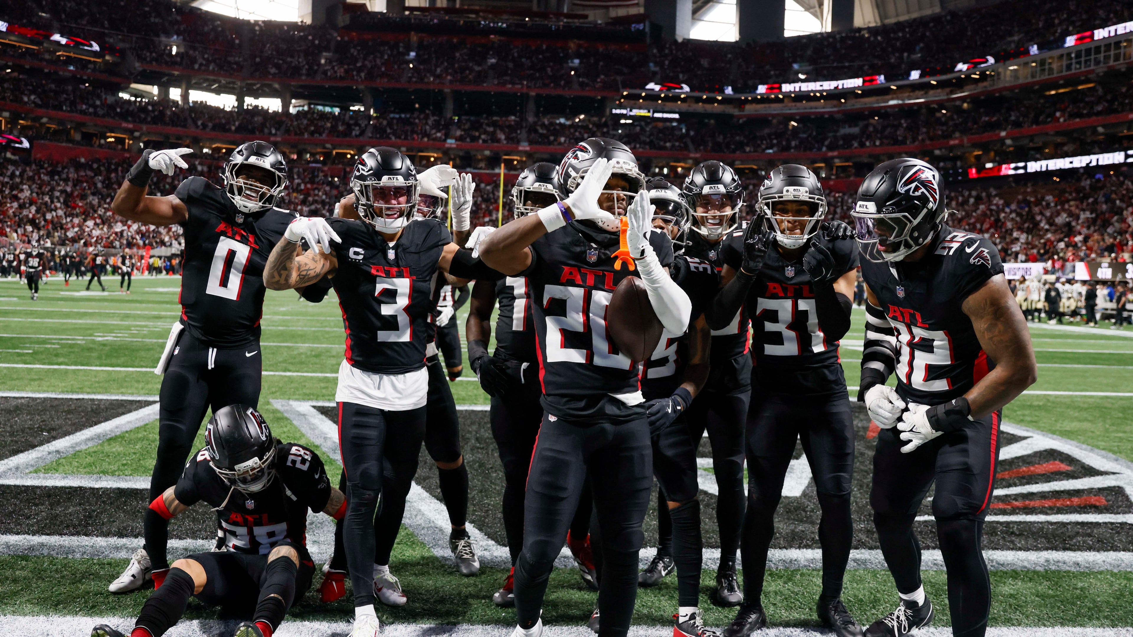 Atlanta Falcons cornerback Dee Alford (20), center, reacts after an interception in the second half of an NFL football game against the New Orleans Saints at Mercedes-Benz Stadium in Atlanta on Sunday, January 4, 2026.
(Miguel Martinez/AJC)