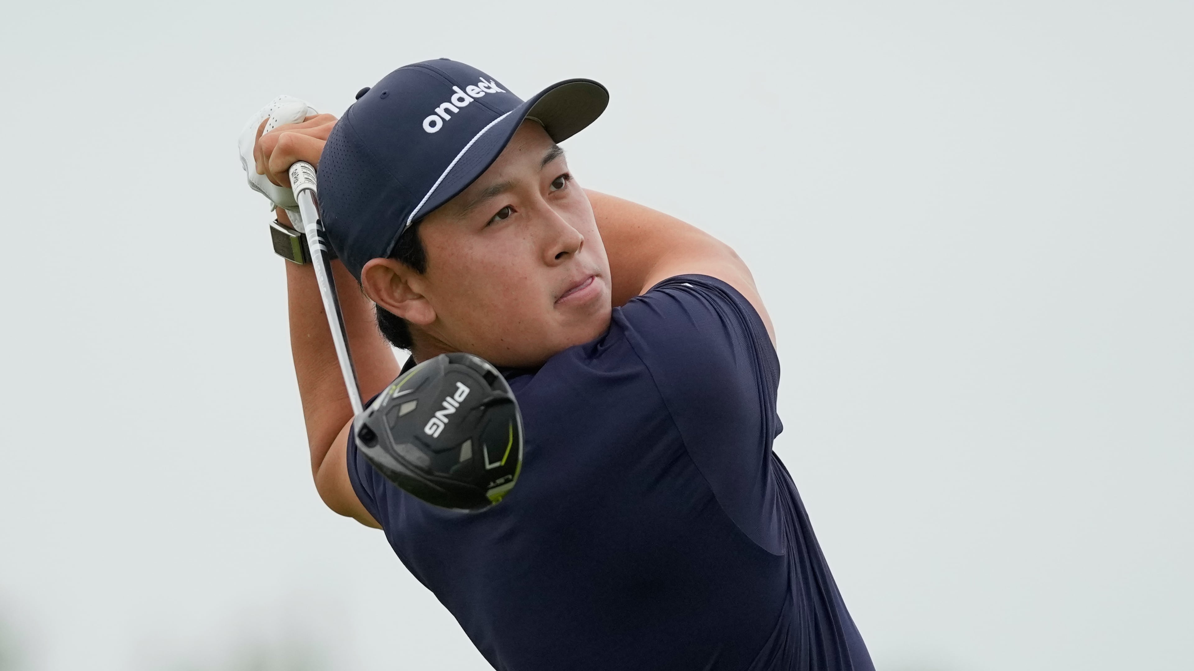 Dylan Wu watches his tee shot on the 13th hole during the first round of the U.S. Open golf tournament at Shinnecock Hills Golf Club in Southampton, N.Y., Thursday, June 18, 2026.(AP Photo/George Walker IV)