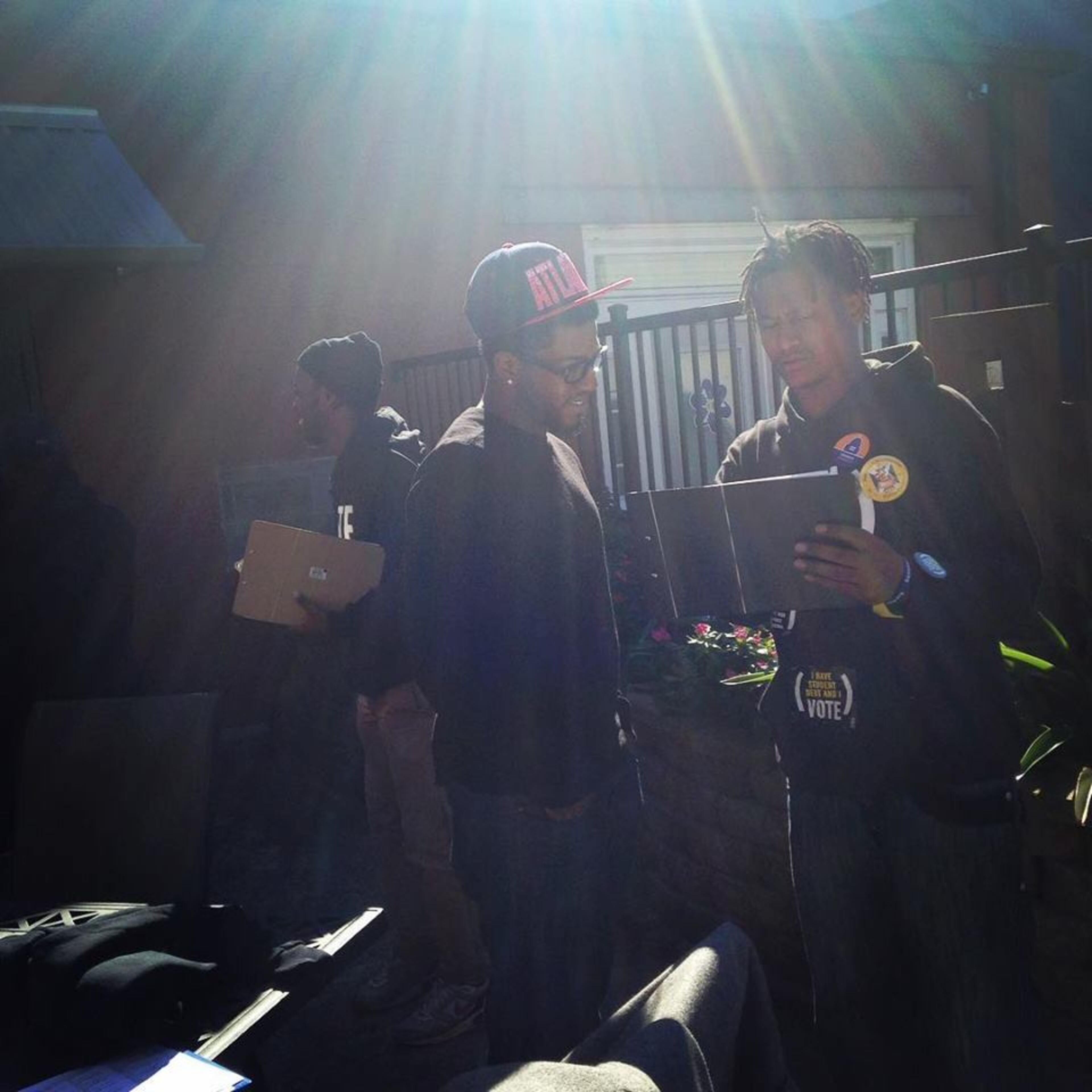 Oscar Cain(far right) at a community event. (Courtesy of LaShunda Campbell)