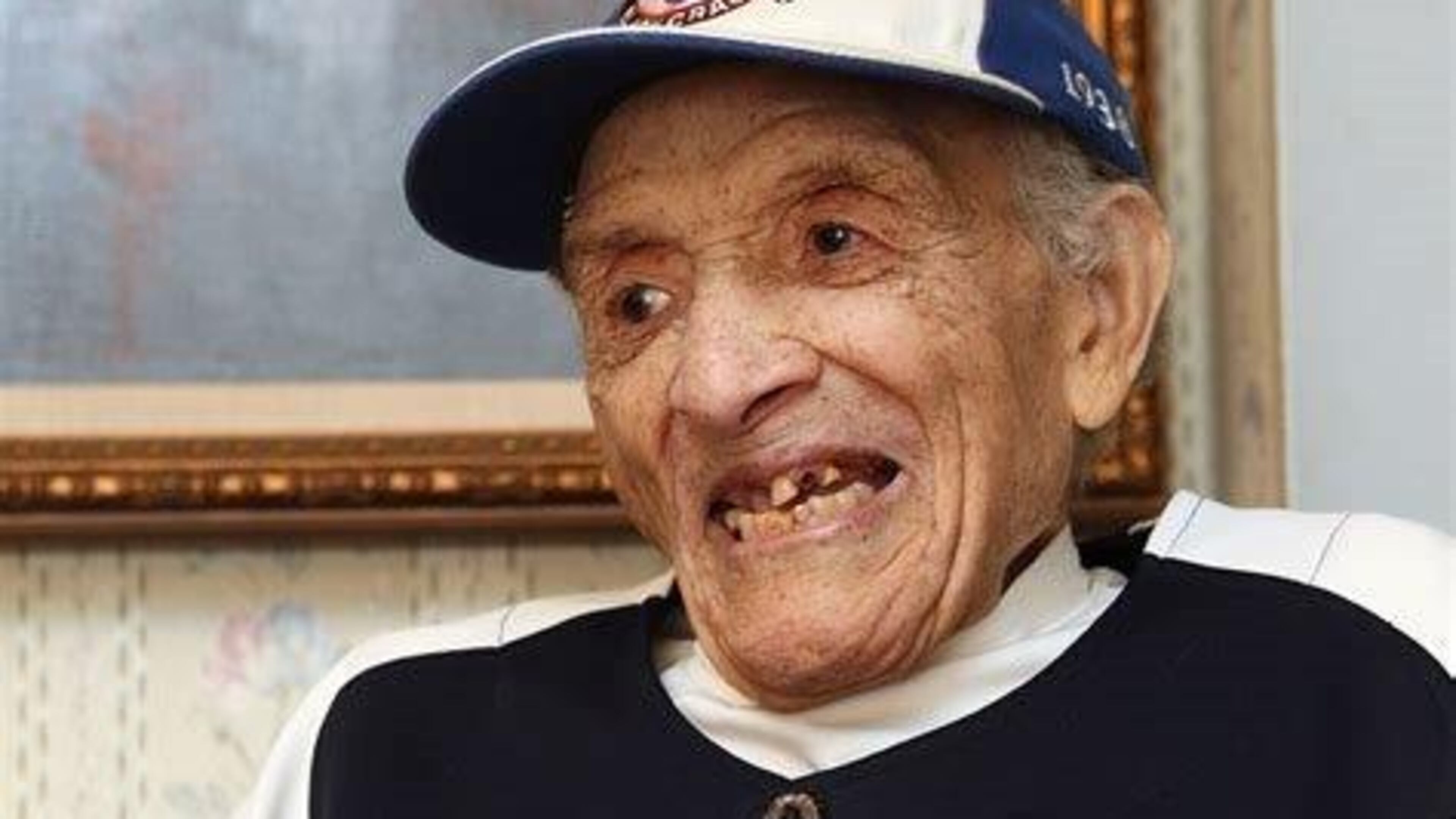 Former Negro Major Leaguer Red Moore several years ago wearing a replica Atlanta Black Crackers jersey. Courtesy of Greg White.