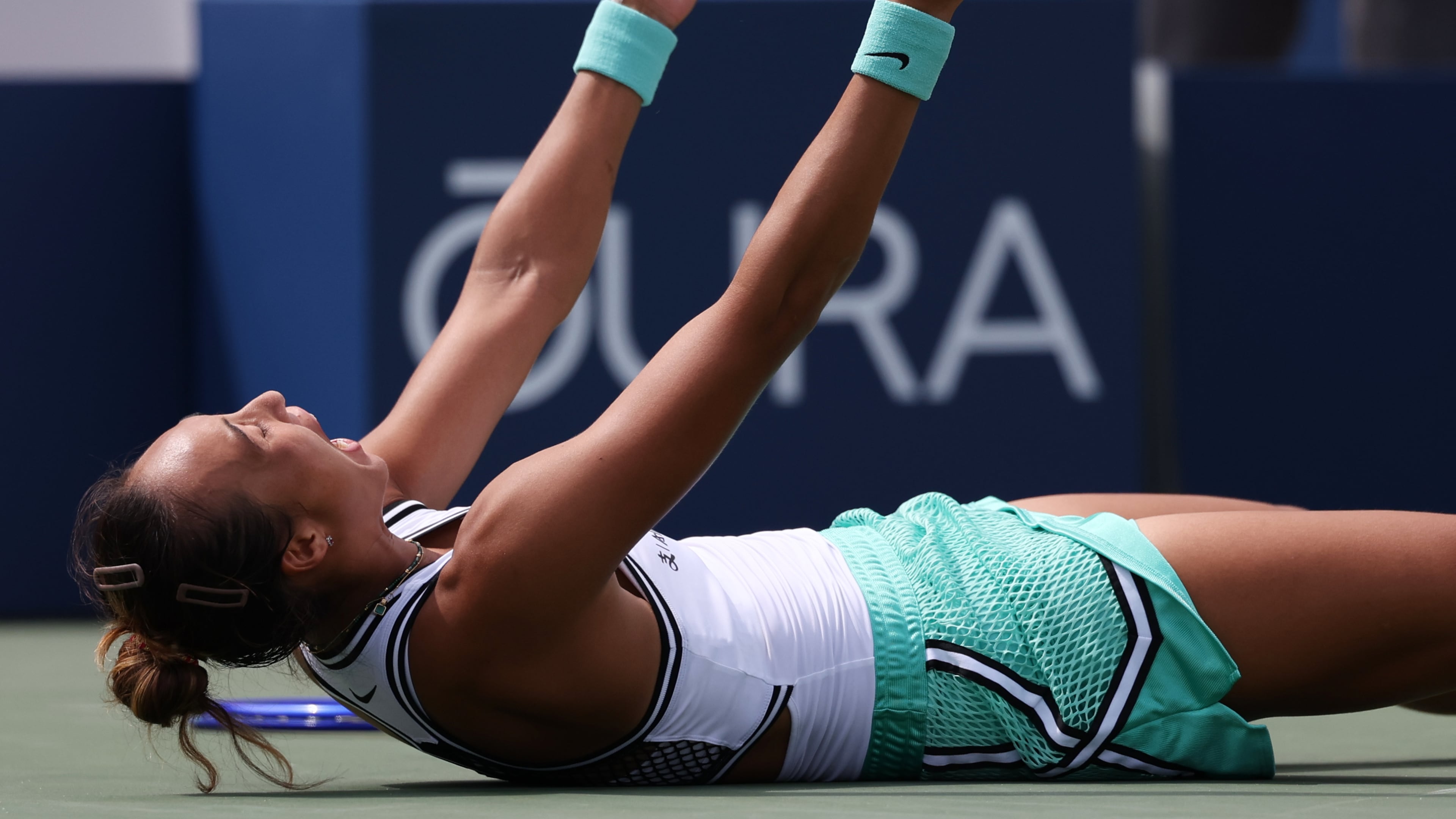 Zheng Qinwen, of China, celebrates after she won her match against Madison Keys, of the United States, during the third round of the U.S. Open tennis championships Saturday, Sept. 5, 2026, in New York. (AP Photo/Heather Khalifa)