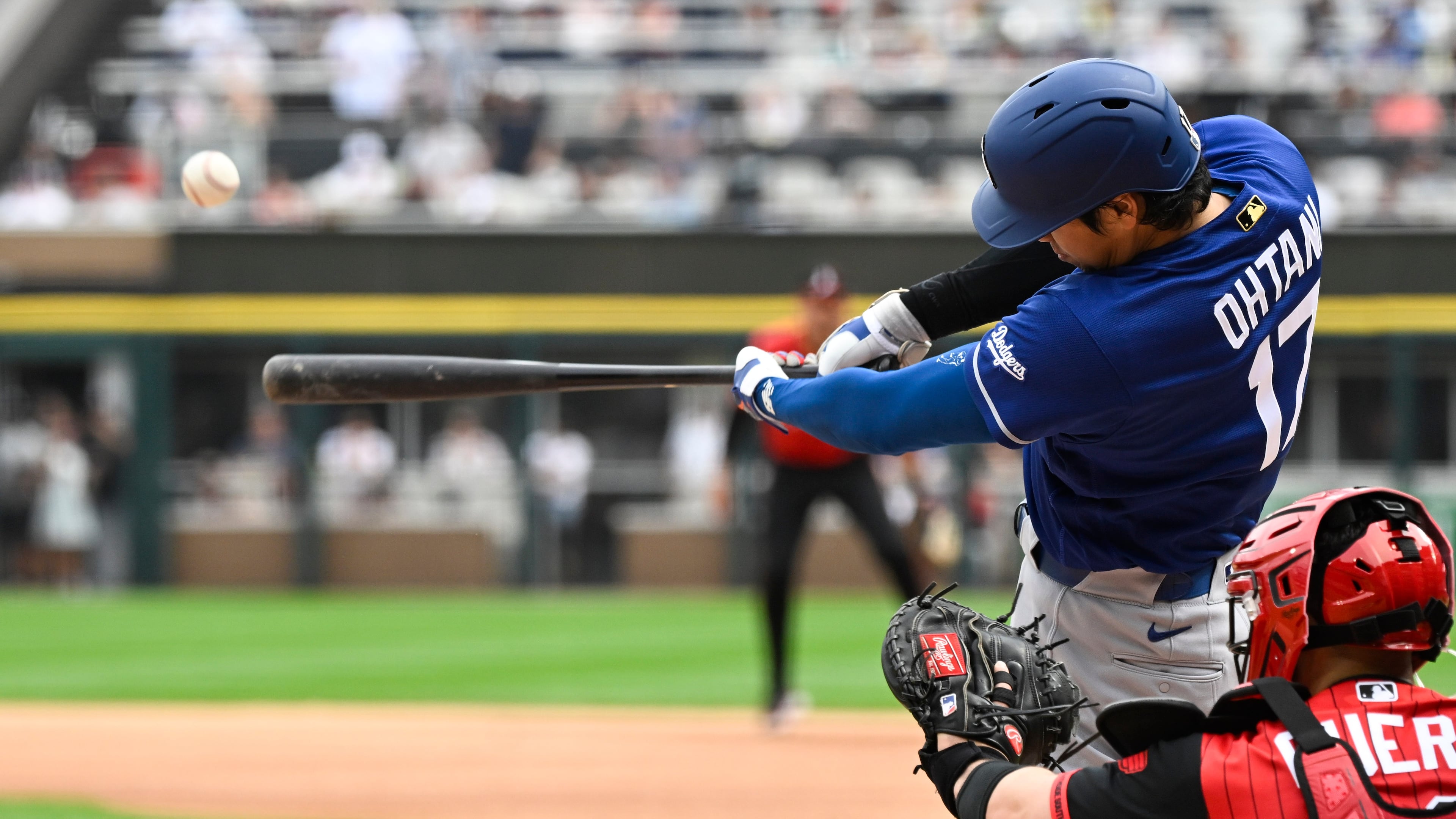 Los Angeles Dodgers' Shohei Ohtani (17), of Japan, hits a home run during the first inning of a baseball game against the Chicago White Sox, Saturday, June 13, 2026, in Chicago. (AP Photo/Matt Marton)