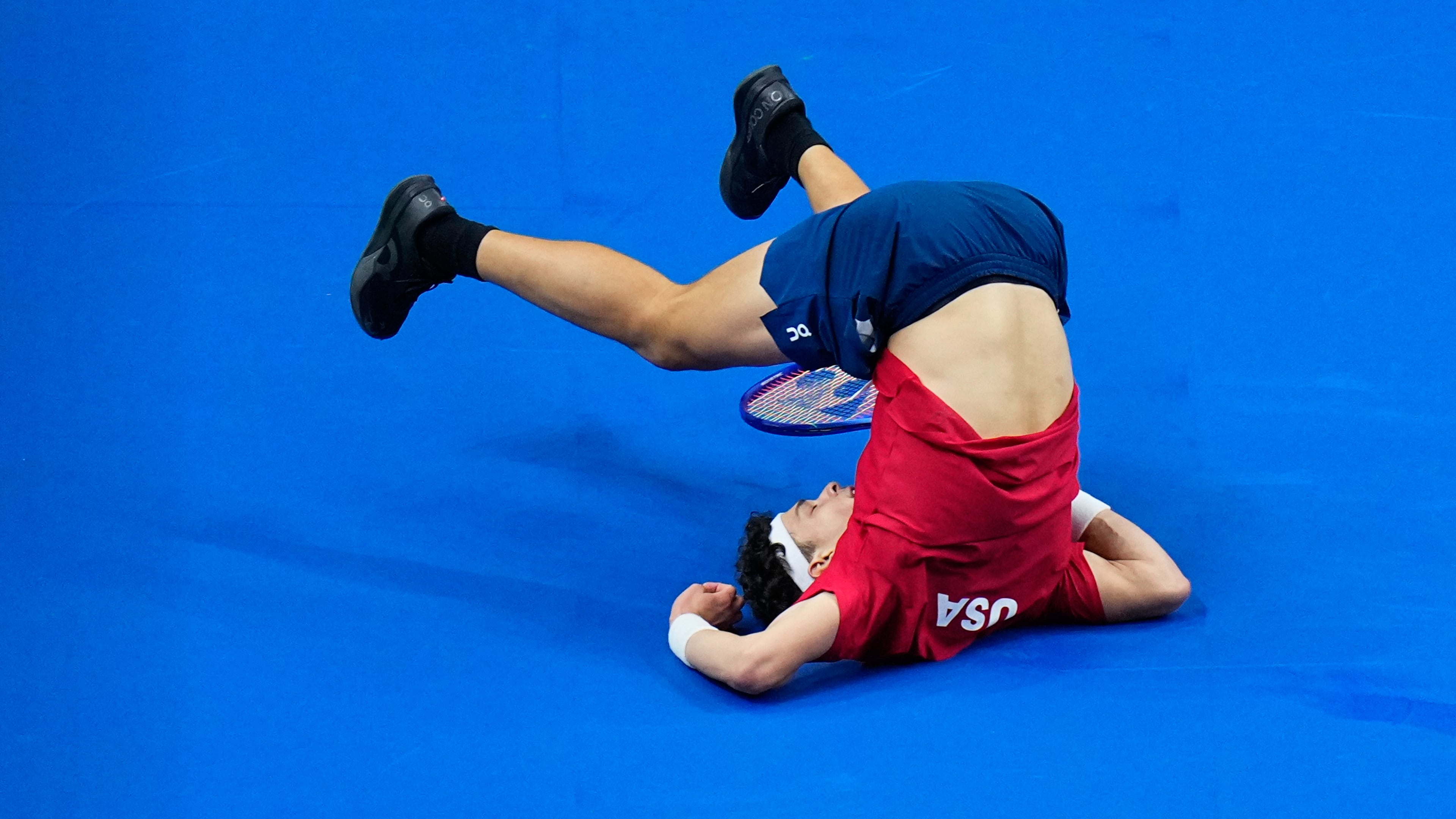 United States' Ben Shelton falls after returning the ball to Czechia's Jiri Lehecka during the Davis Cup second round qualifier match between the Czech Republic and the United States, in Prague, Friday, Sept. 18, 2026. (AP Photo/Petr David Josek)