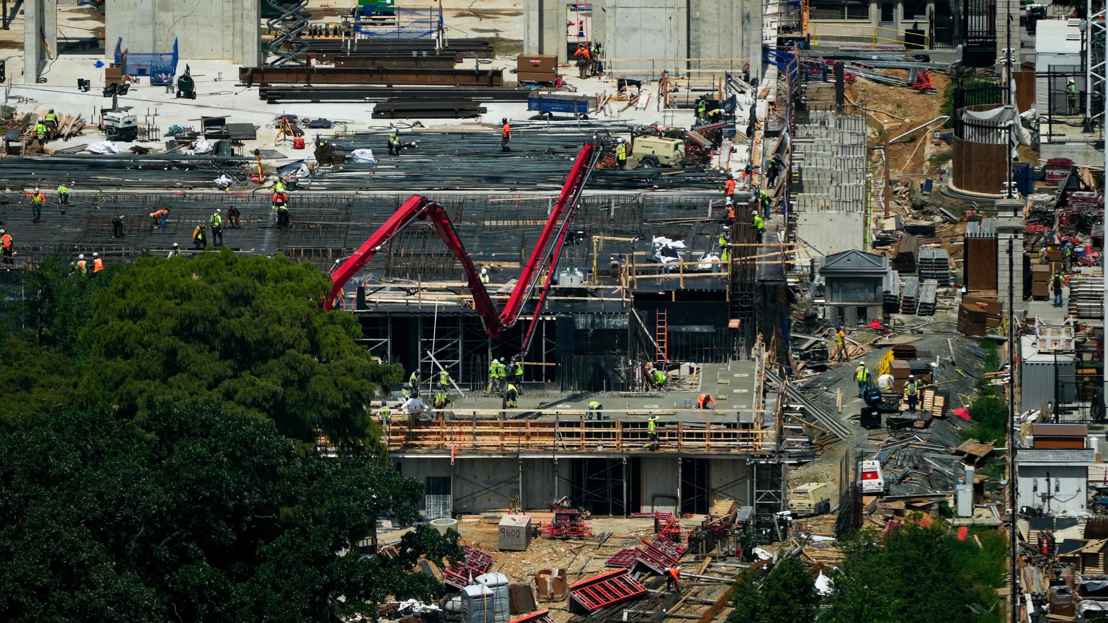Workers continue construction on the new White House ballroom, as seen from the Washington Monument, Monday, Aug. 17, 2026, in Washington. (AP Photo/Julia Demaree Nikhinson)