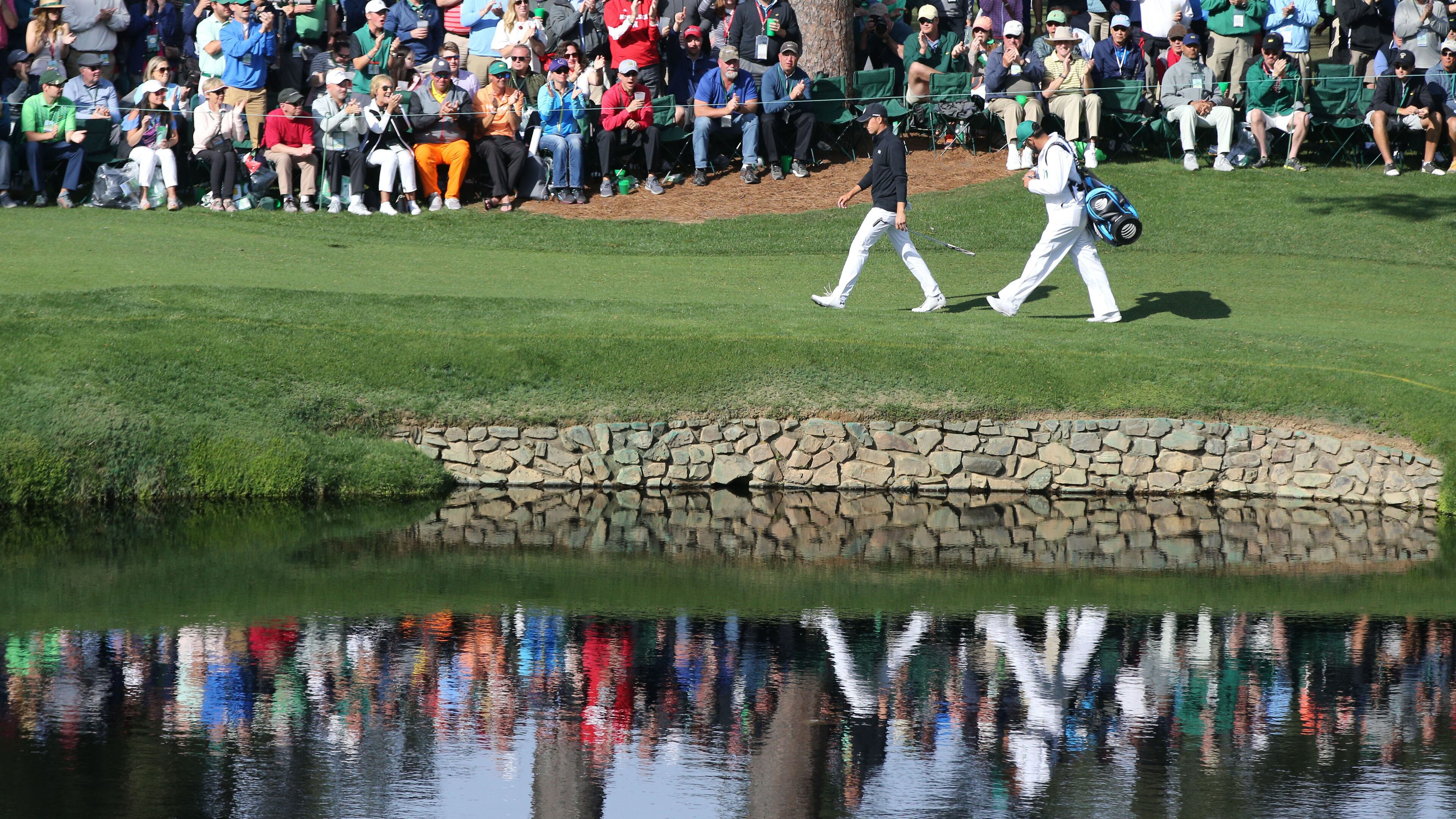Jordan Spieth walks the fairway to the hole on fifteen during the final round of the Masters Tournament Sunday, April 8, 2018, at Augusta National Golf Club.