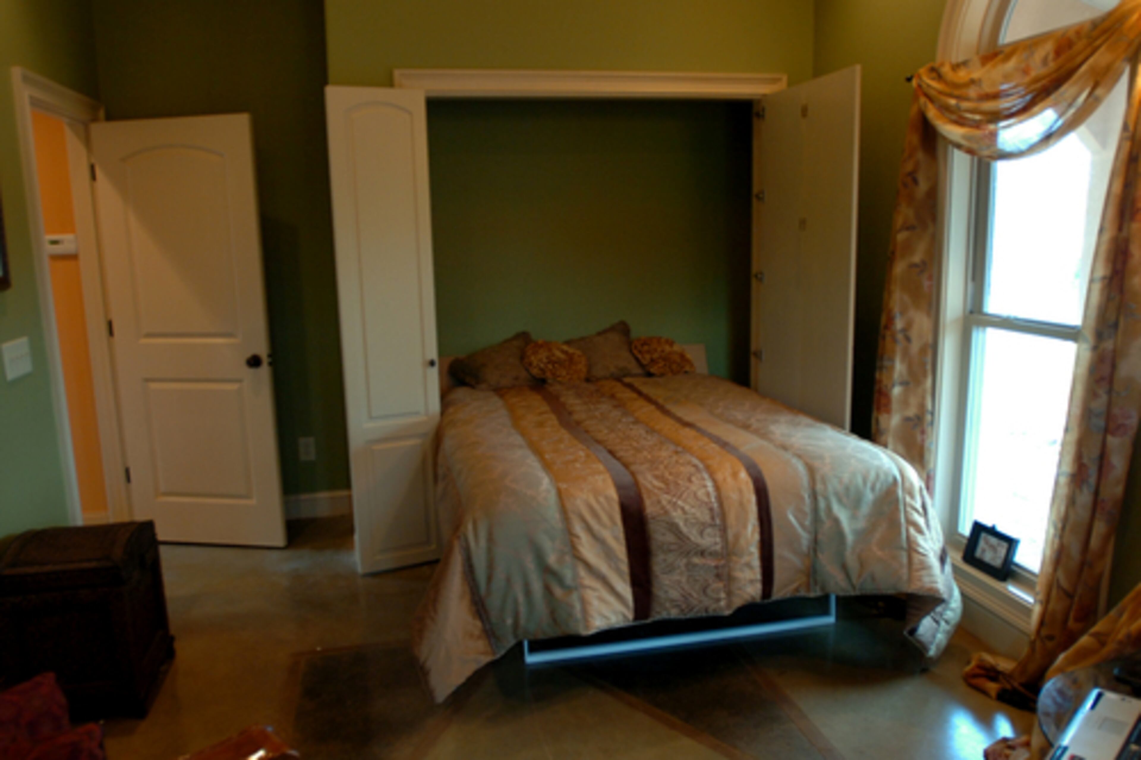 The guest room has a built-in Murphy bed hidden behind double wood doors, offering the owners lots of flexibility for visiting guests and grandkids.