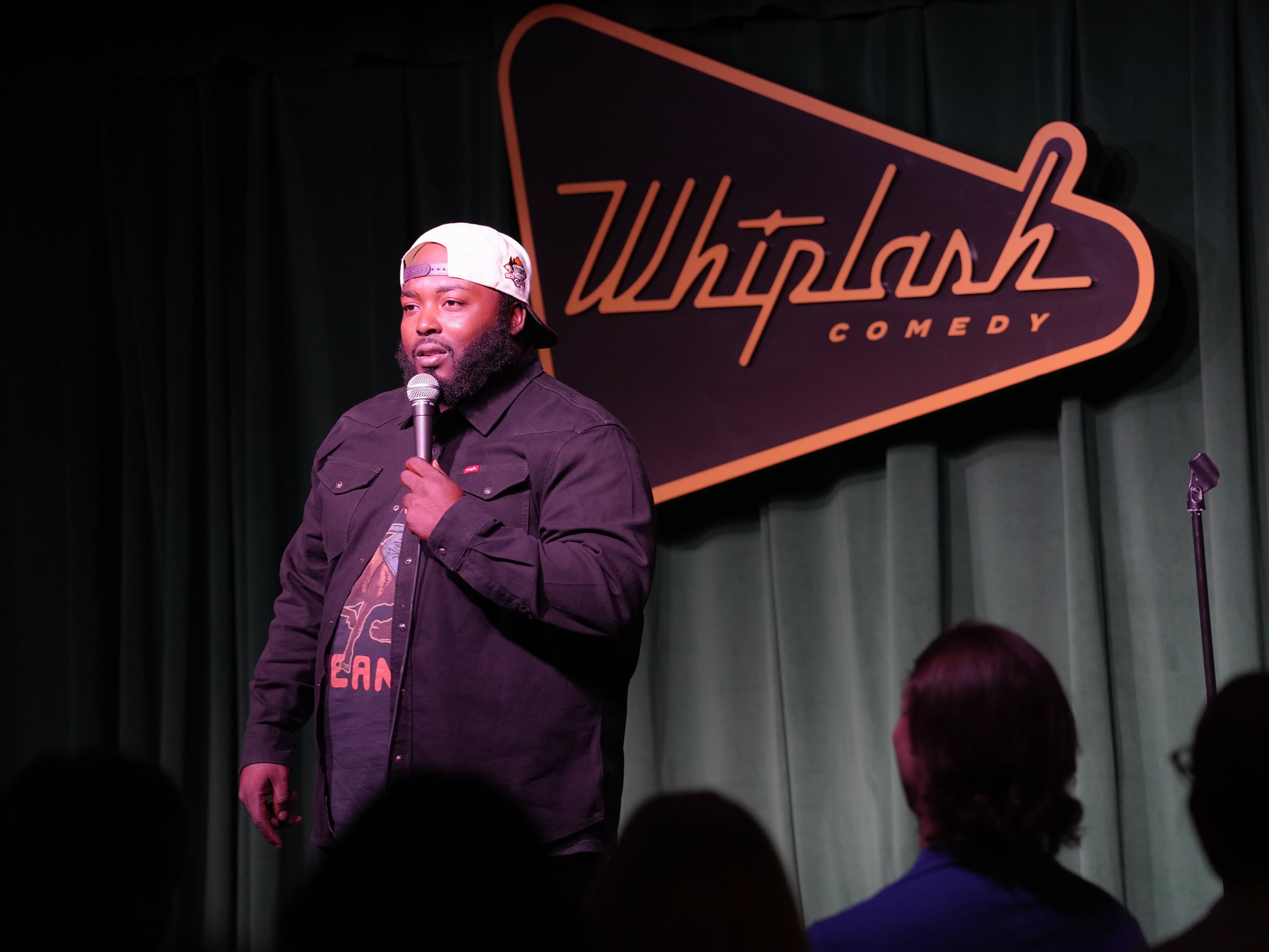 On Whiplash Comedy Club's first open night, for friends and family, Atlanta comic Brian Tucker (known as B-Tuck) performs in the Main Squeeze room on Oct. 9, 2026. (Courtesy of Adriana Gooden)