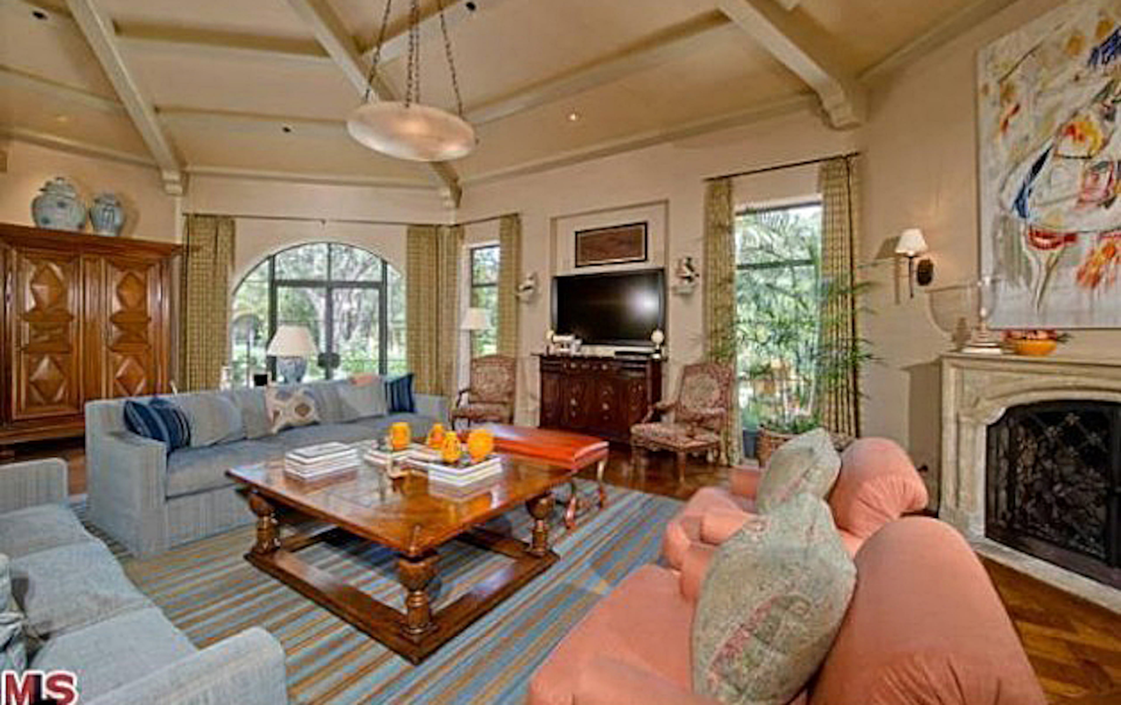 Take a peek inside Christina Aguilera's Beverly Hills mansion. The home, which Aguilera bought for $10.75 million in 2013, features six bedrooms, nine bathrooms, a master suite with a fireplace, a patio, an office, a spa bath, a screening room and wet bars. The property also includes a pool and spa. For more information, visit http://www.toptenrealestatedeals.com/homes/weekly-ten-best-home-deals/2013/5-14-2013/.