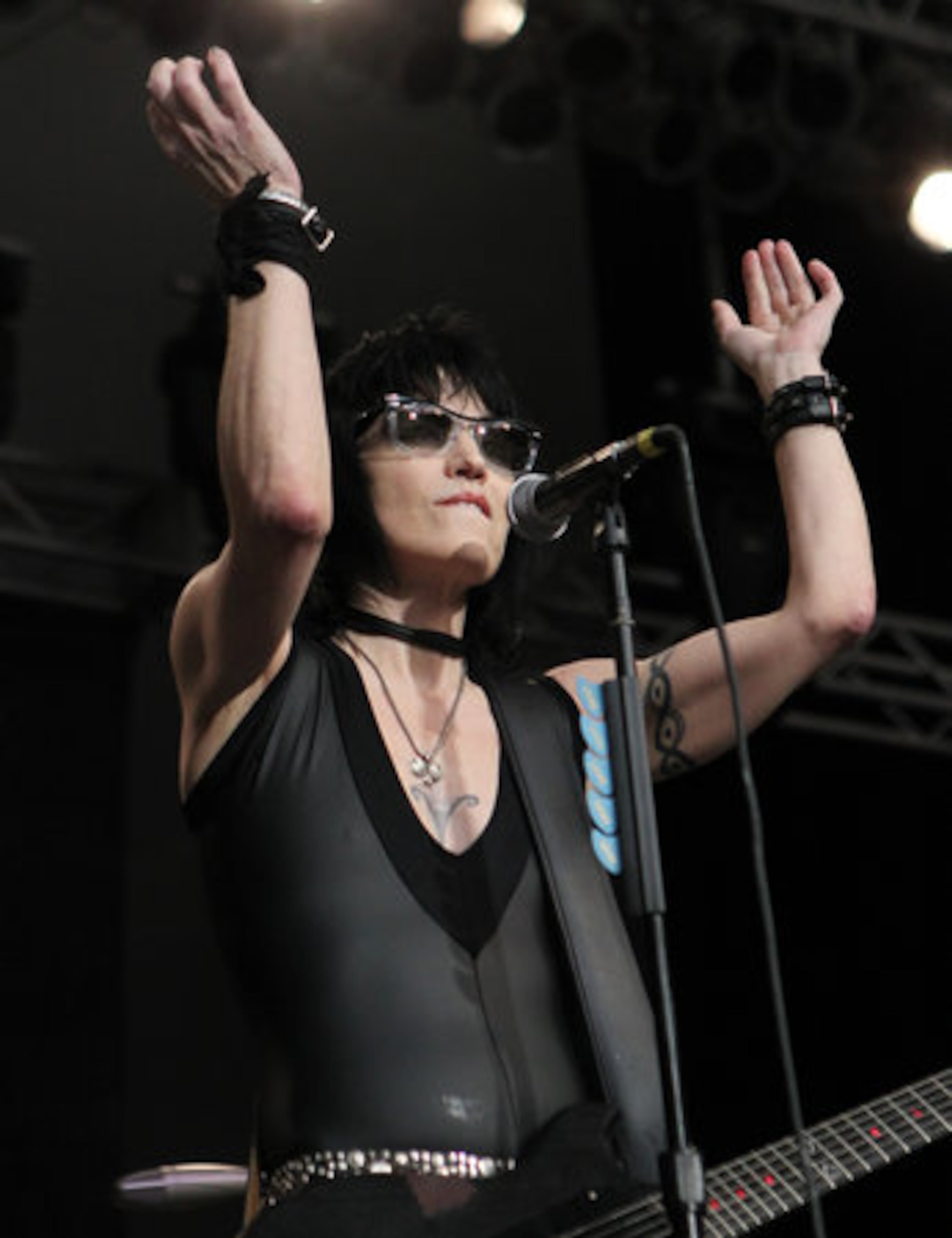 American rock guitarist, singer, songwriter, producer and actress Joan Jett inspires the crowd to clap along as she performs with Joan Jett & the Blackhearts at Chastain Park Amphitheatre on Sunday, August 29, 2010. The group's hit "I Love Rock 'n' Roll" was #1 on the Billboard Hot 100 from March 20 to May 1, 1982.