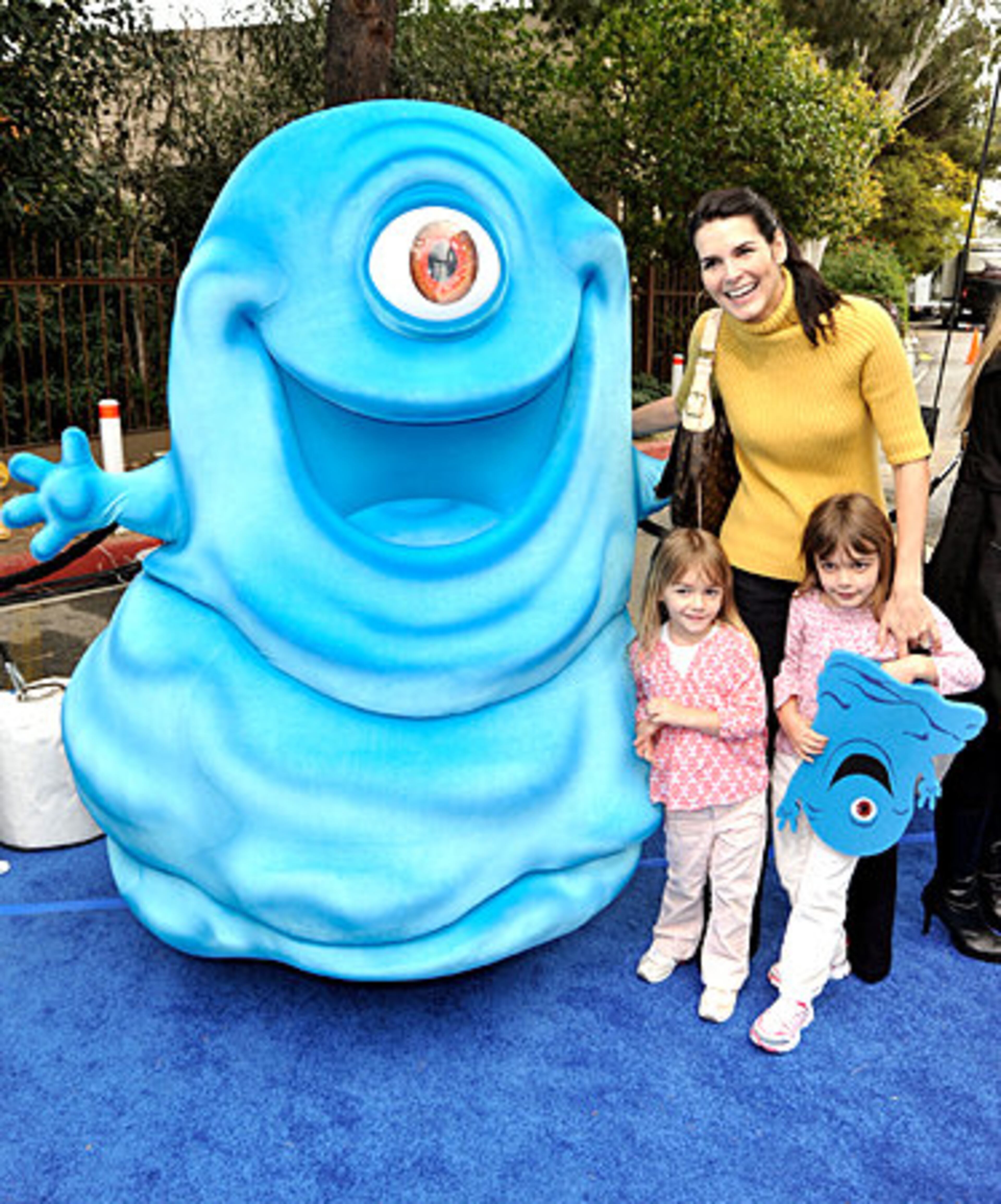 Actress Angie Harmon and kids arrive at the premiere.