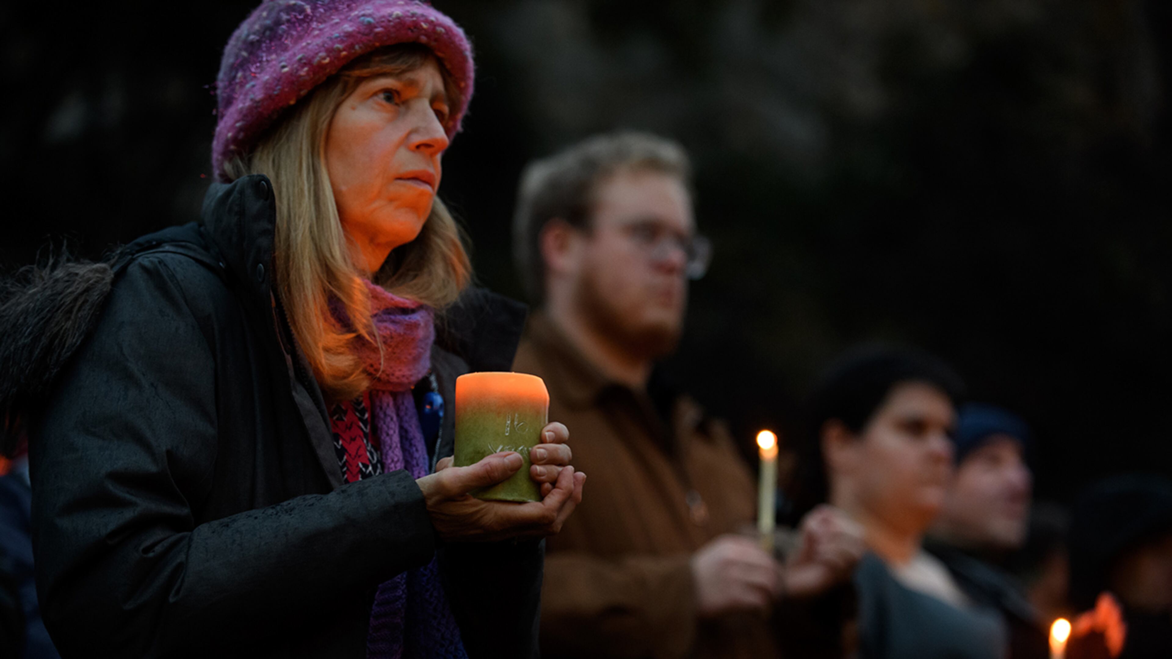 PITTSBURGH, PA - OCTOBER 27: People gather for a interfaith candlelight vigil a few blocks away from the site of a mass shooting at the Tree of Life Synagogue on October 27, 2018 in Pittsburgh, Pennsylvania. According to reports, at least 12 people were shot, 4 dead and three police officers hurt during the incident. The shooter surrendered to authorities and was taken into custody. (Photo by Jeff Swensen/Getty Images)
